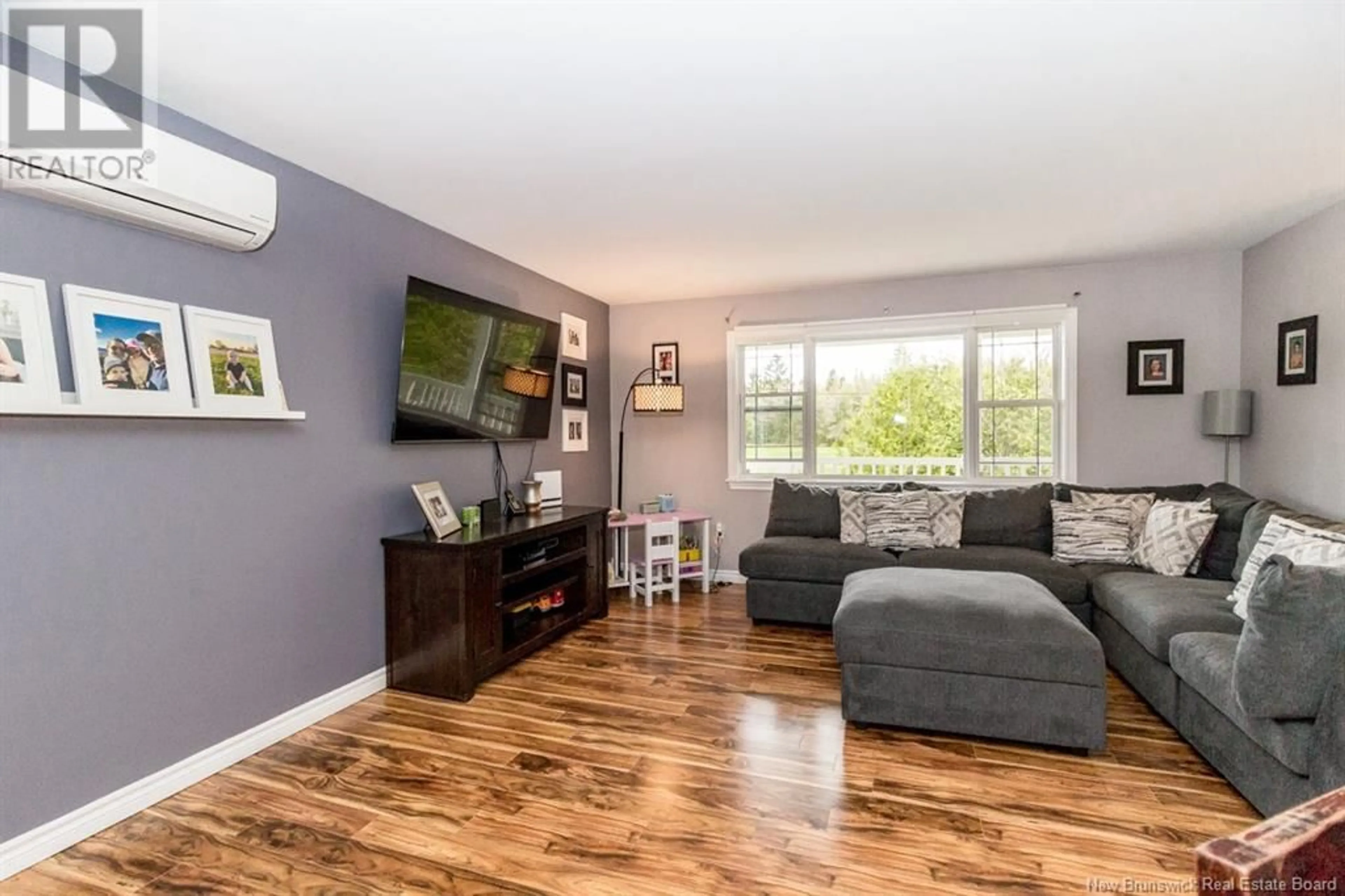 Living room with furniture, wood/laminate floor for 156 HILL ROAD, Kingston New Brunswick E5N1H7