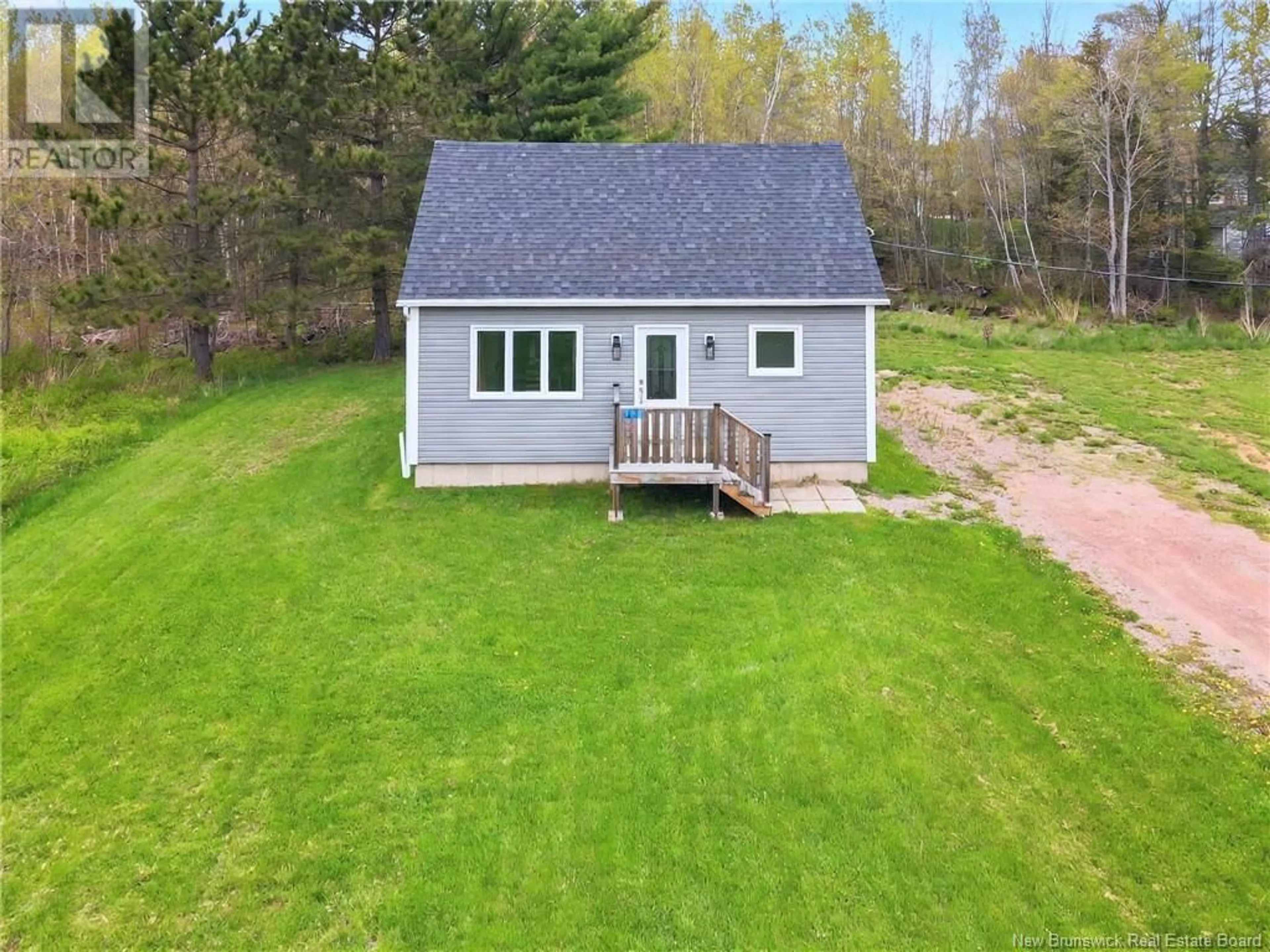 A pic from outside/outdoor area/front of a property/back of a property/a pic from drone, water/lake/river/ocean view for 128 TROIS-RUISSEAUX ROAD, Cap-Pelé New Brunswick E4N2B8