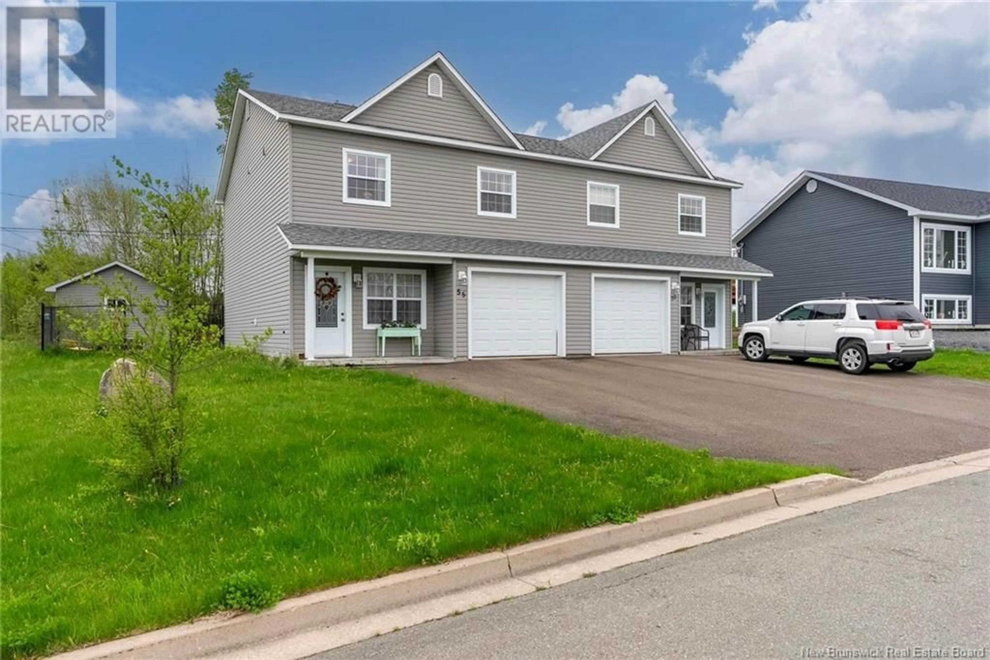Home with vinyl exterior material, street for 55 YOUSEFF STREET, Fredericton New Brunswick E3G4K1