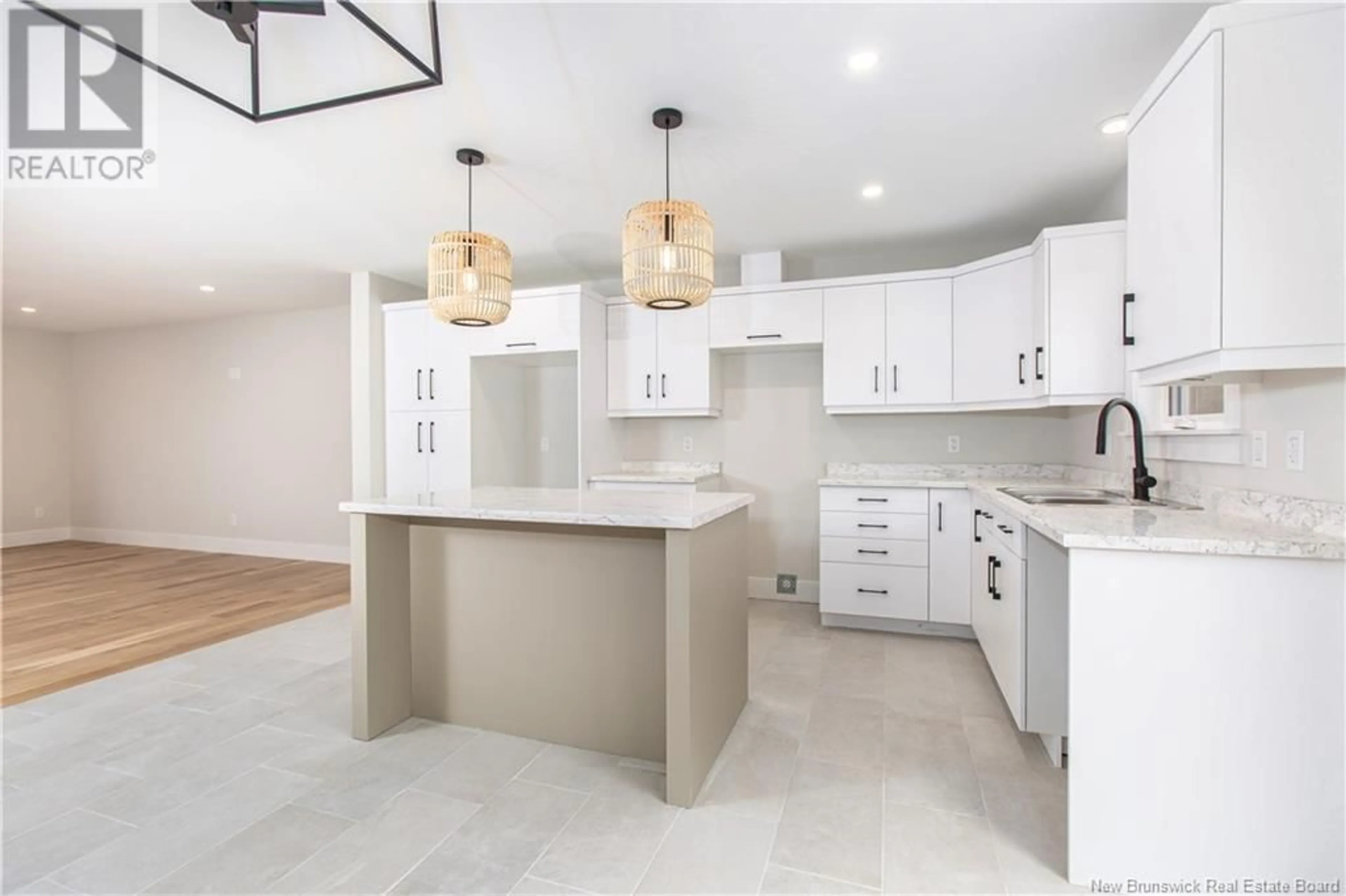Open concept kitchen, ceramic/tile floor for 25 XAVIER AVENUE, Moncton New Brunswick E1A6J8