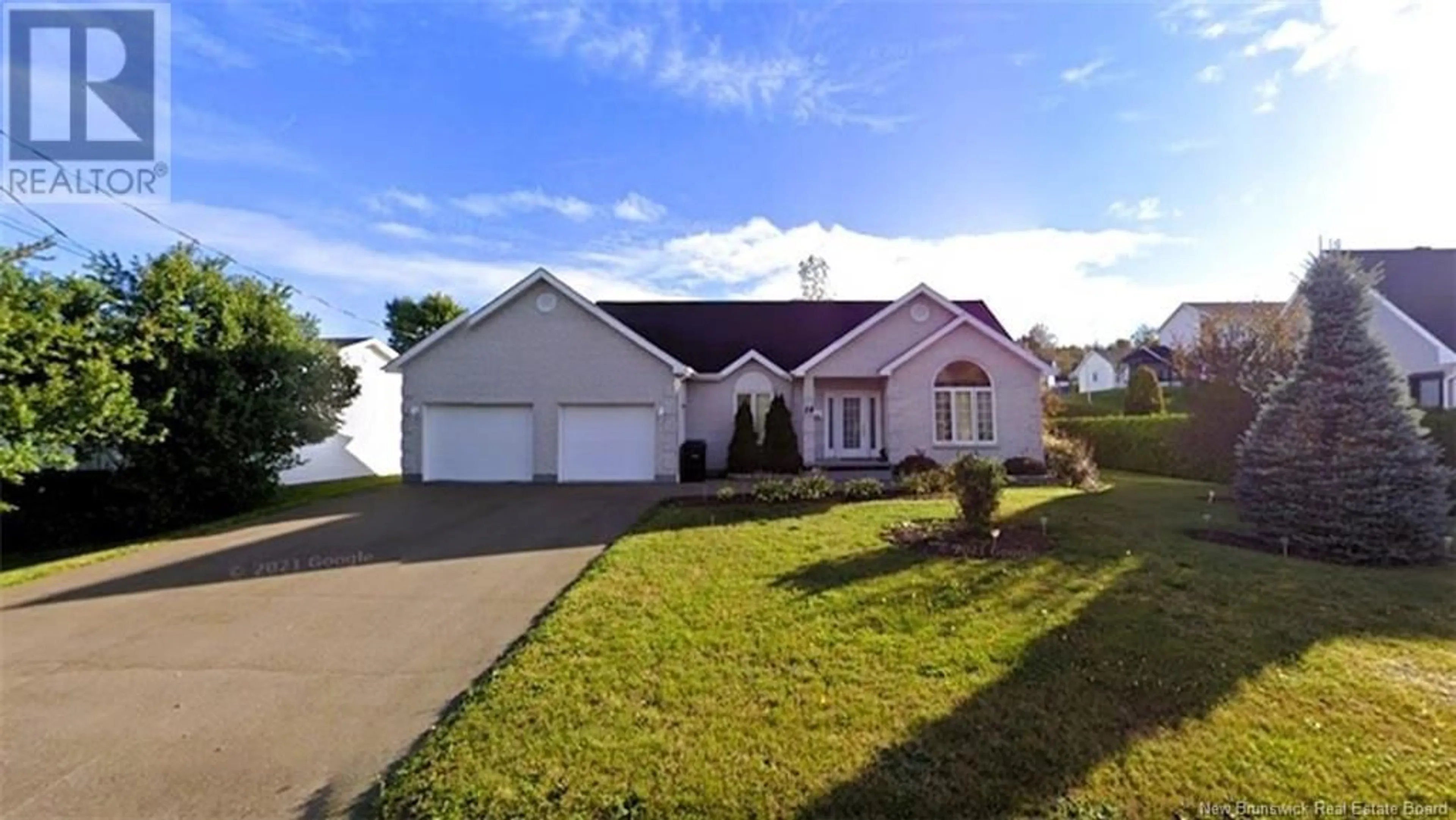 A pic from outside/outdoor area/front of a property/back of a property/a pic from drone, unknown for 14 DES CHAMPS STREET, Edmundston New Brunswick E3V4Z3