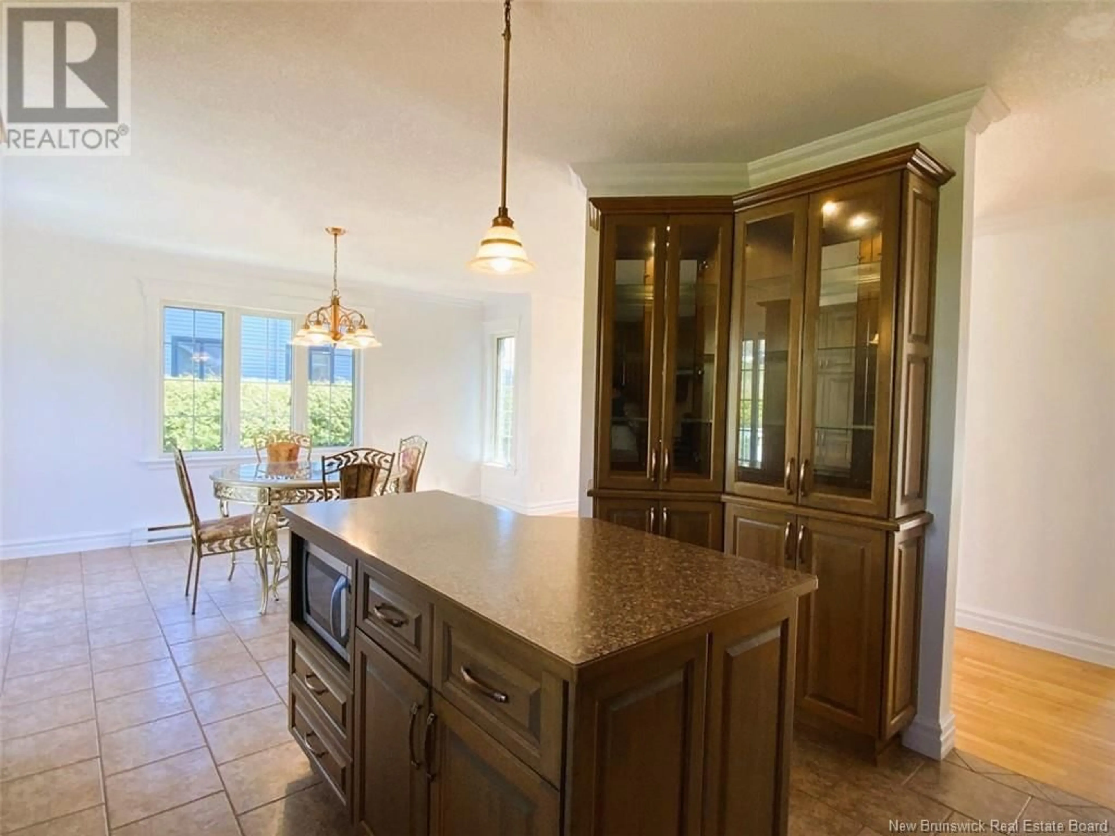 Open concept kitchen, ceramic/tile floor for 14 DES CHAMPS STREET, Edmundston New Brunswick E3V4Z3