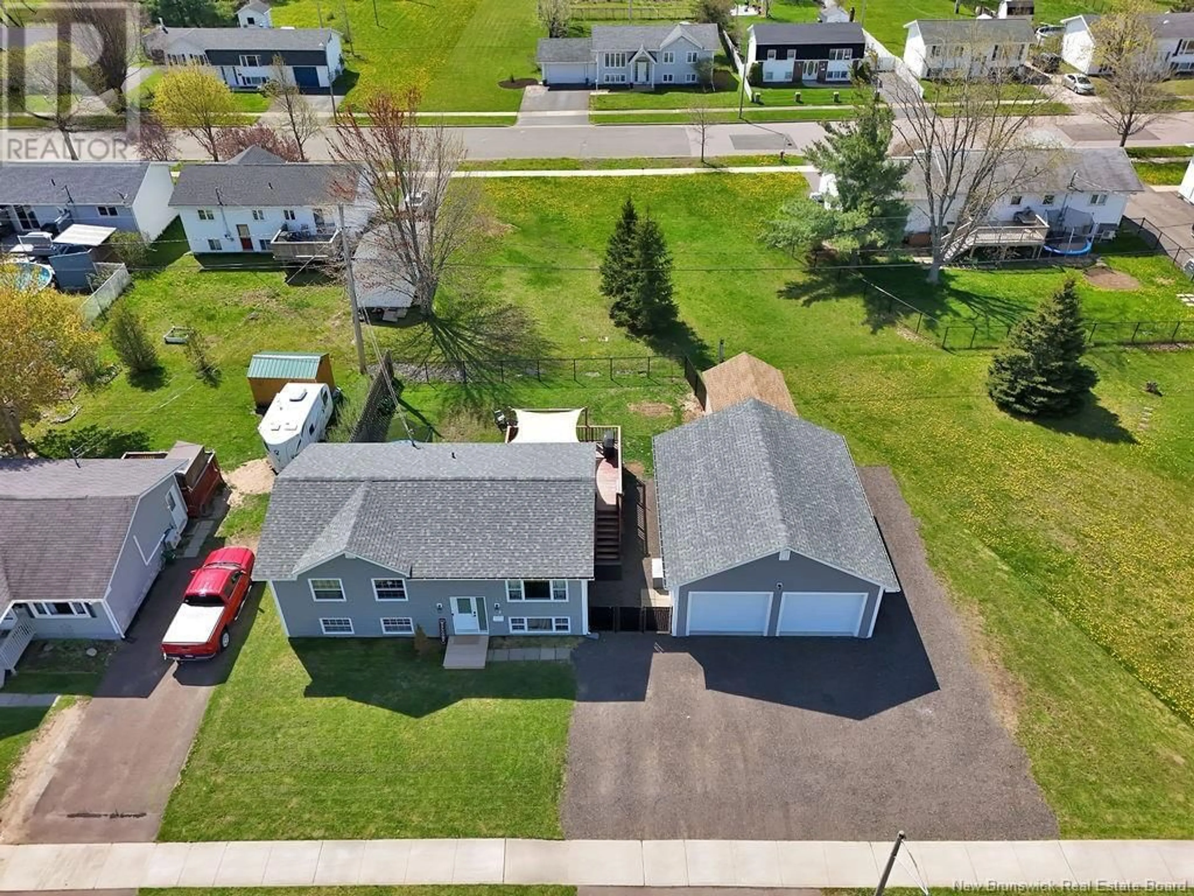 A pic from outside/outdoor area/front of a property/back of a property/a pic from drone, street for 39 SATINWOOD, Moncton New Brunswick E1G1C3