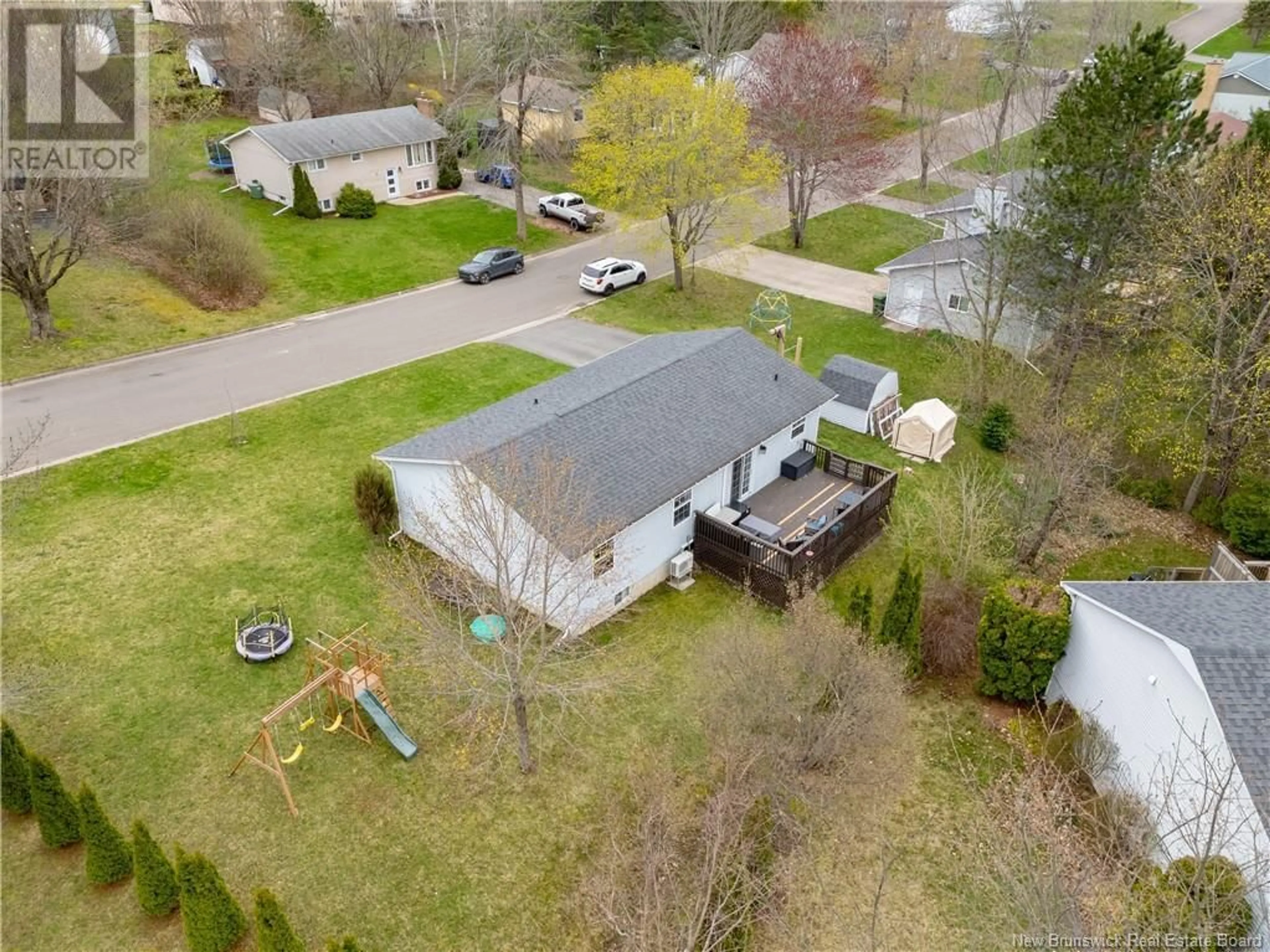 A pic from outside/outdoor area/front of a property/back of a property/a pic from drone, street for 7 DAY STREET, Fredericton New Brunswick E3B7E1