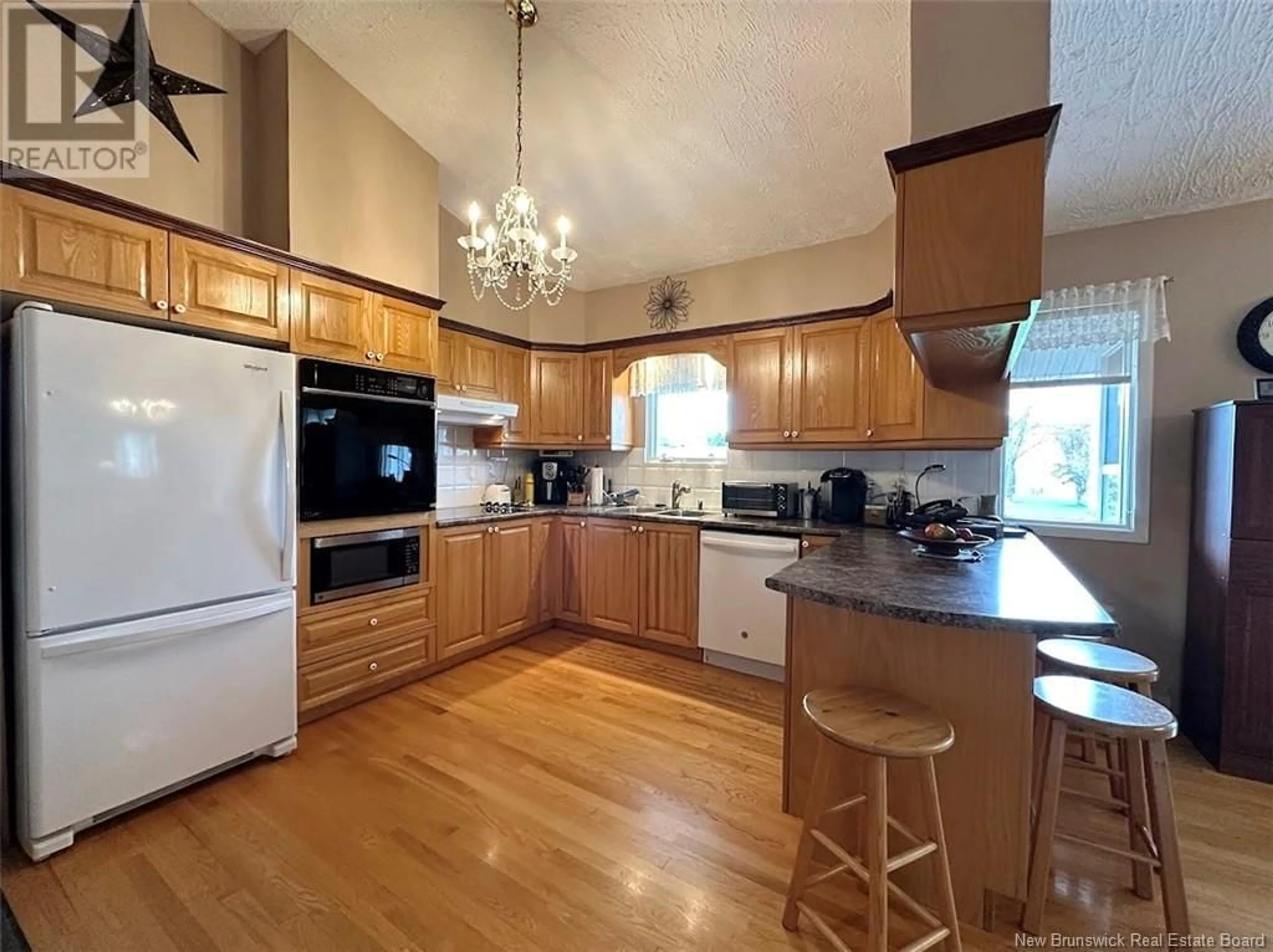 Open concept kitchen, wood/laminate floor for 1375 ST-FRANÇOIS STREET, Verret New Brunswick E3V4P1