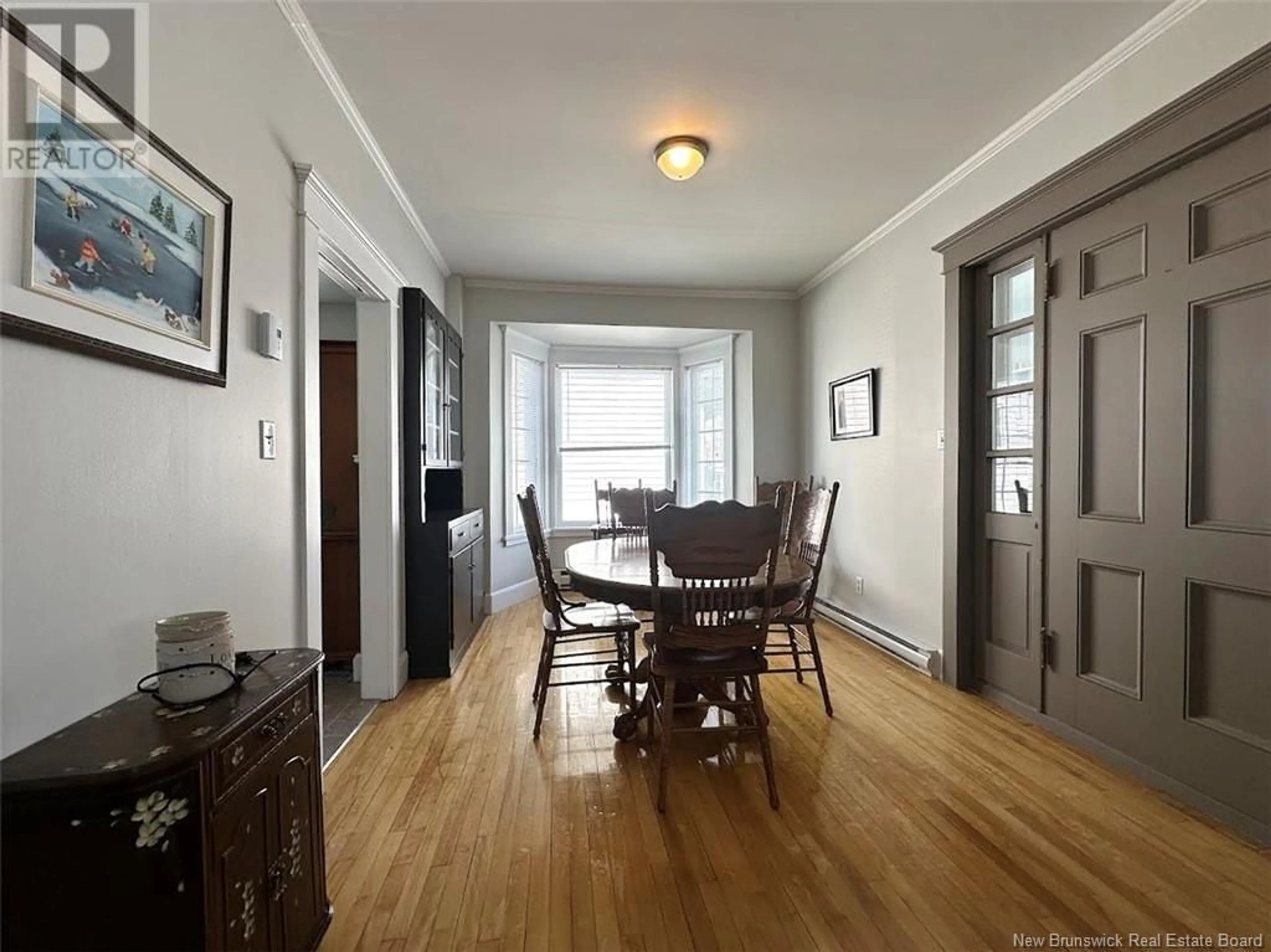 Dining room, wood/laminate floor for 30 FRASER AVENUE, Edmundston New Brunswick E3V2B1