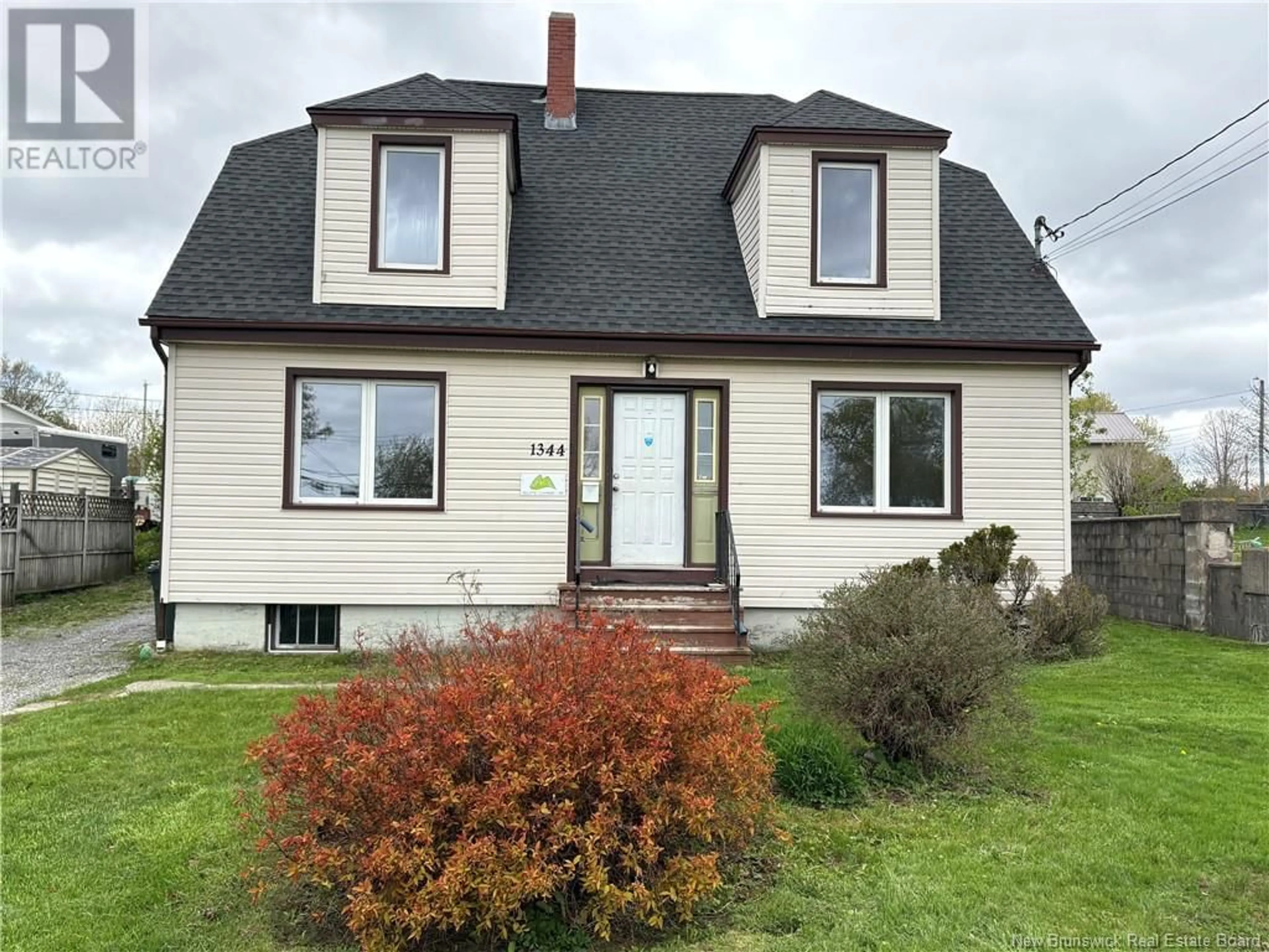 Home with vinyl exterior material, street for 1344 MANAWAGONISH ROAD, Saint John New Brunswick E2M3Y1
