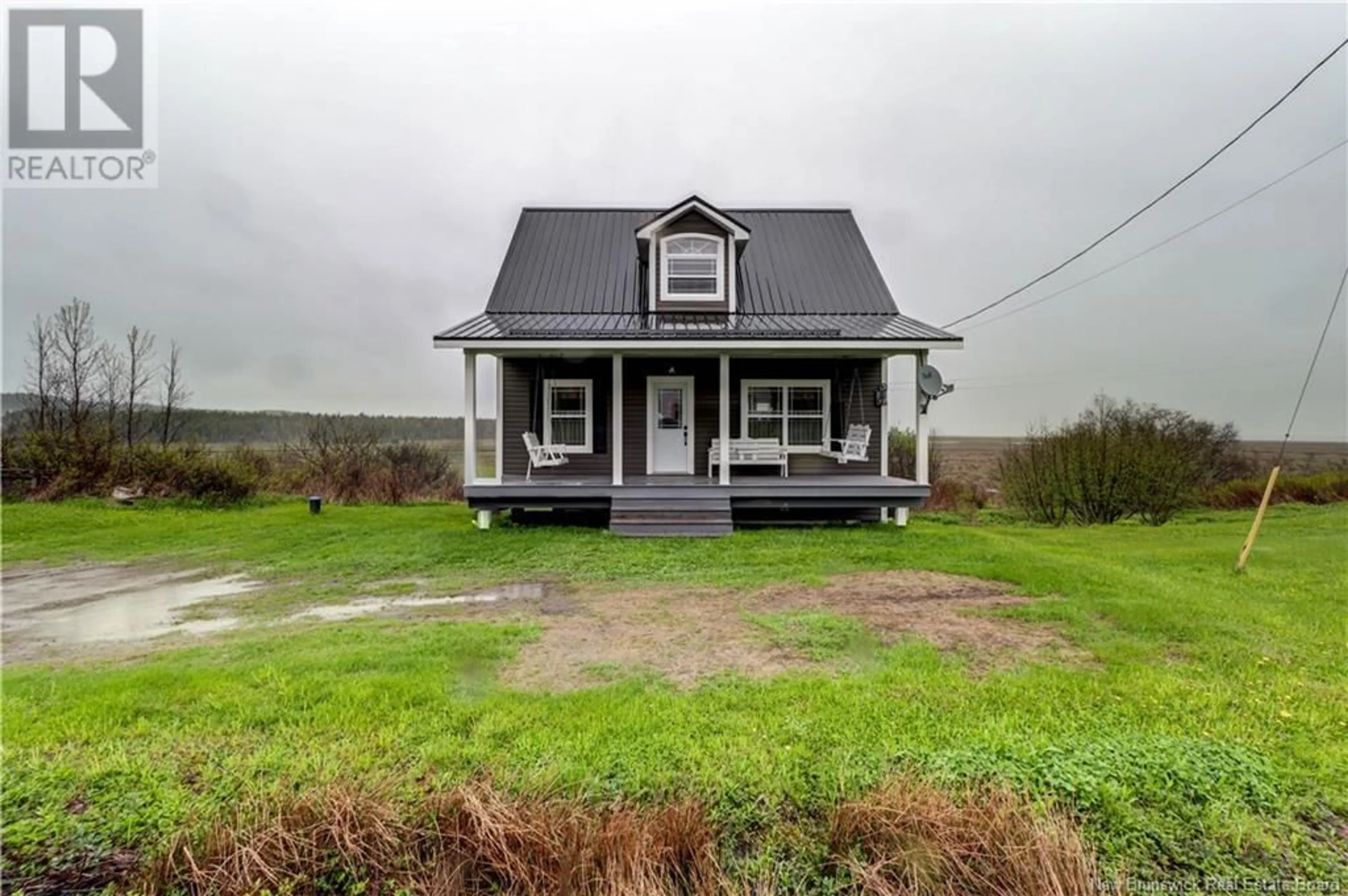 A pic from outside/outdoor area/front of a property/back of a property/a pic from drone, unknown for 23 WEST QUACO ROAD, West Quaco New Brunswick E5R1M5