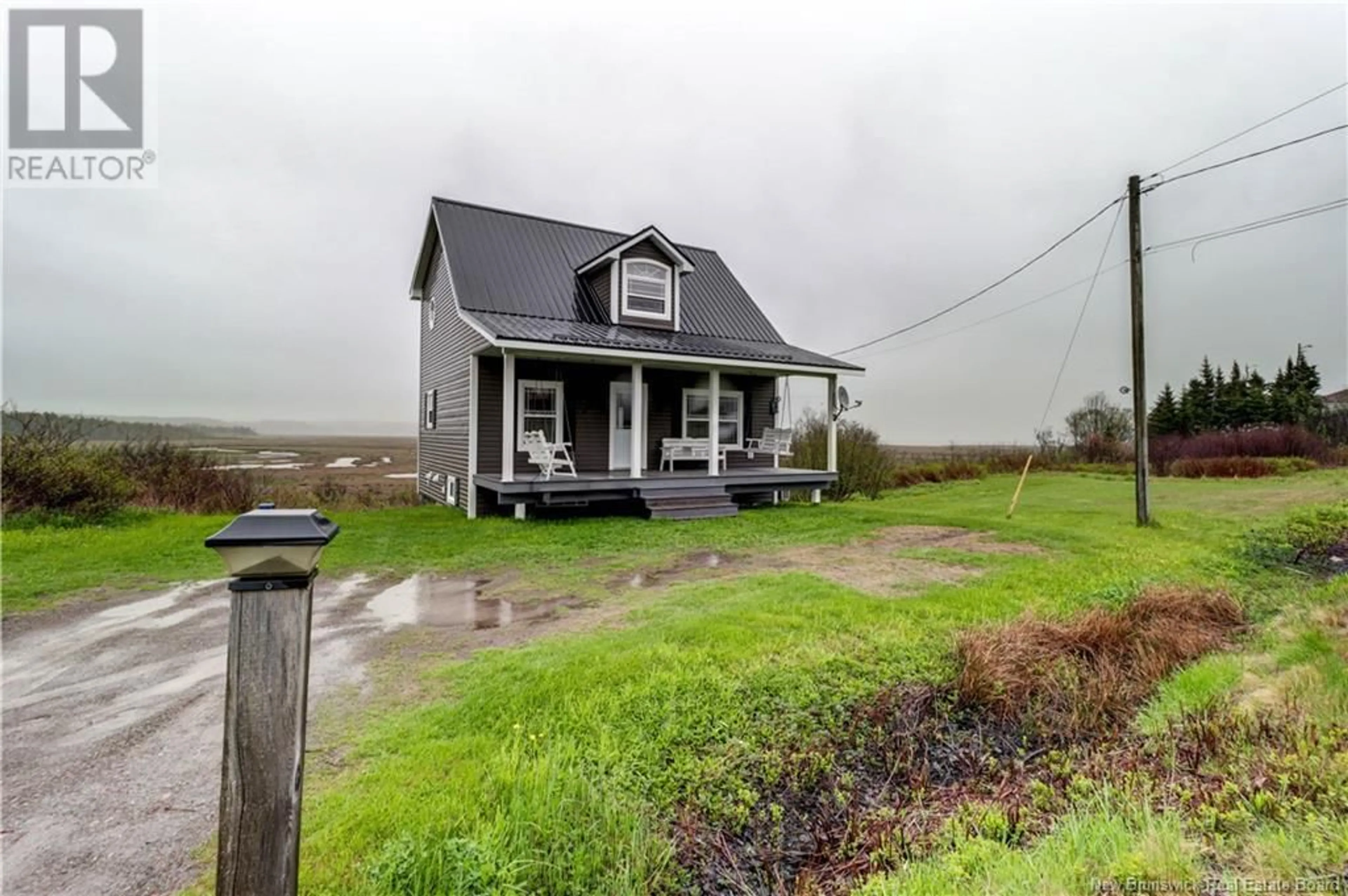 A pic from outside/outdoor area/front of a property/back of a property/a pic from drone, water/lake/river/ocean view for 23 WEST QUACO ROAD, West Quaco New Brunswick E5R1M5
