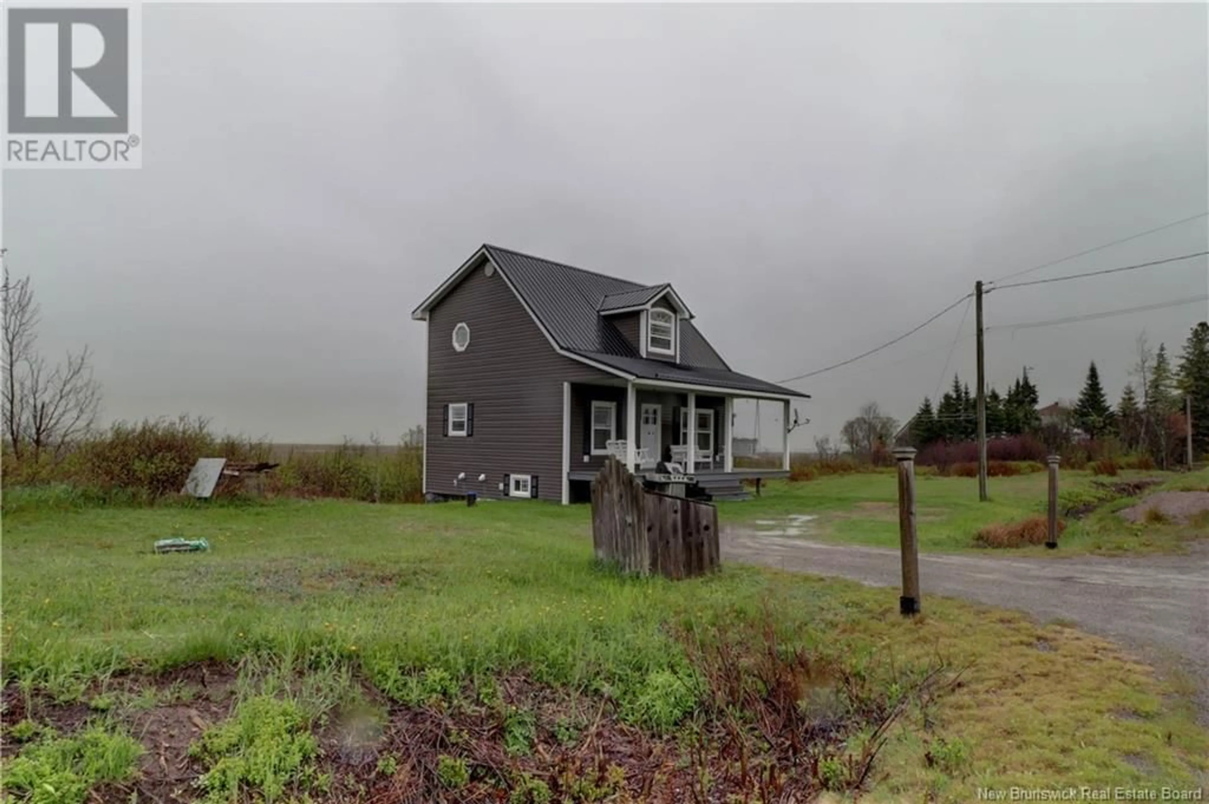 A pic from outside/outdoor area/front of a property/back of a property/a pic from drone, street for 23 WEST QUACO ROAD, West Quaco New Brunswick E5R1M5