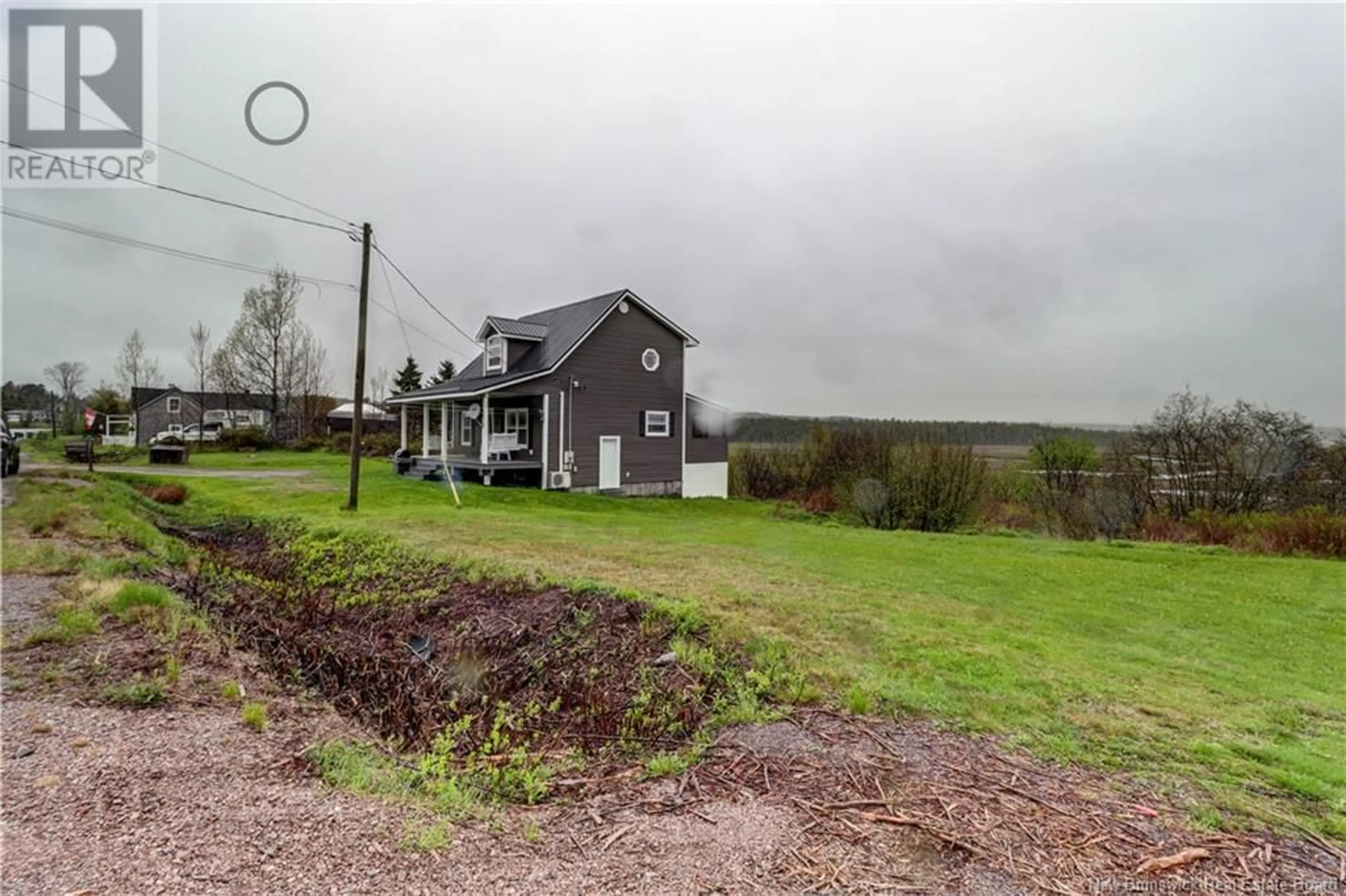 A pic from outside/outdoor area/front of a property/back of a property/a pic from drone, water/lake/river/ocean view for 23 WEST QUACO ROAD, West Quaco New Brunswick E5R1M5