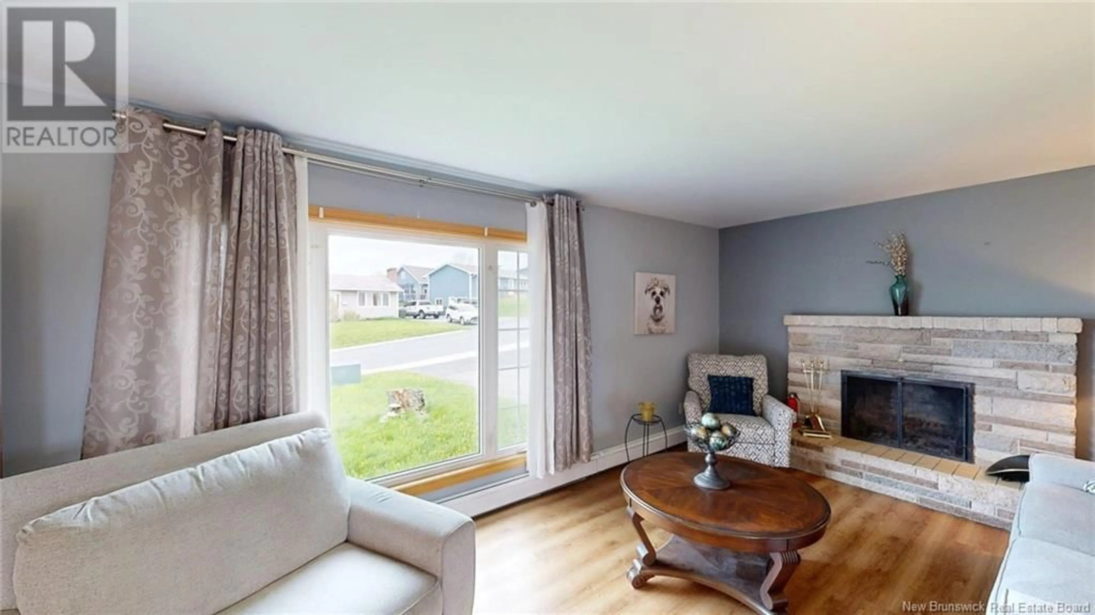 Living room with furniture, wood/laminate floor for 669 MICHAEL CRESCENT, Saint John New Brunswick E2J2S9