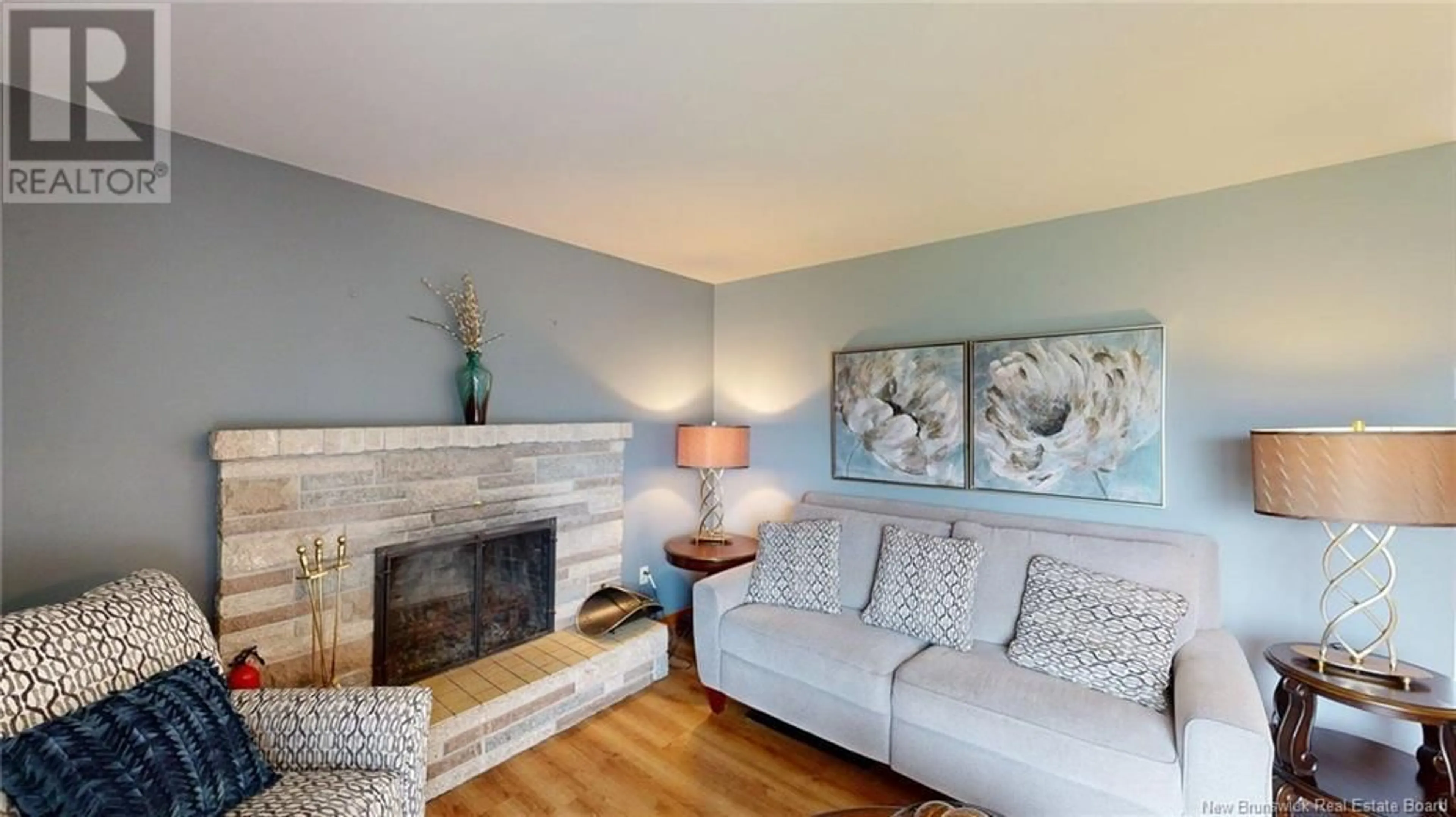 Living room with furniture, wood/laminate floor for 669 MICHAEL CRESCENT, Saint John New Brunswick E2J2S9