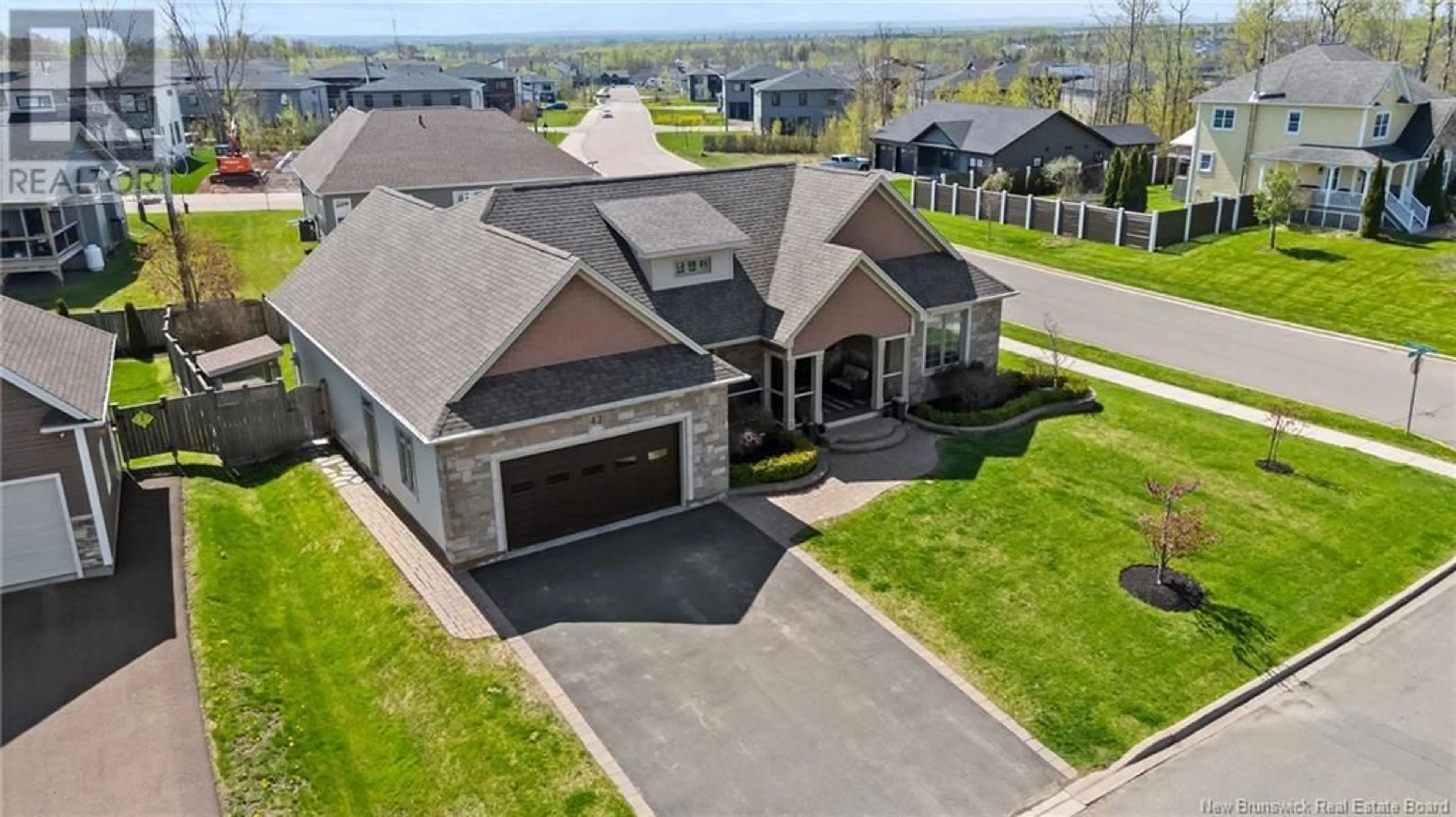 A pic from outside/outdoor area/front of a property/back of a property/a pic from drone, street for 42 BLACKSTONE, Moncton New Brunswick E1G0P2