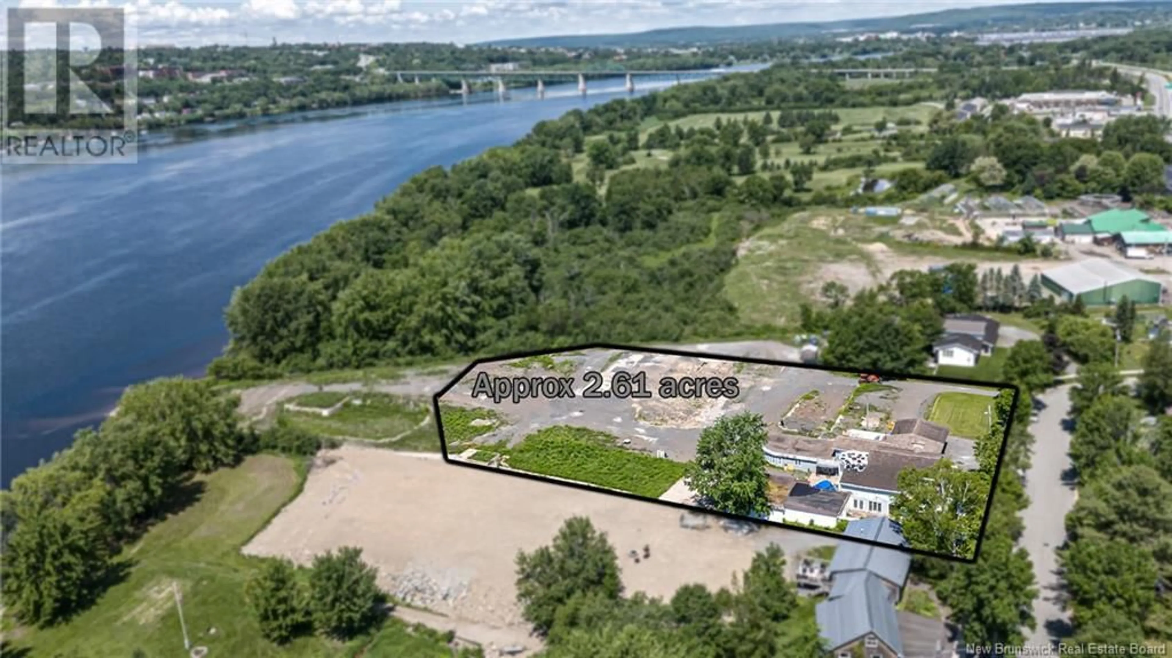 A pic from outside/outdoor area/front of a property/back of a property/a pic from drone, water/lake/river/ocean view for 59-69 ROSS TERRACE, Fredericton New Brunswick W3A8E5