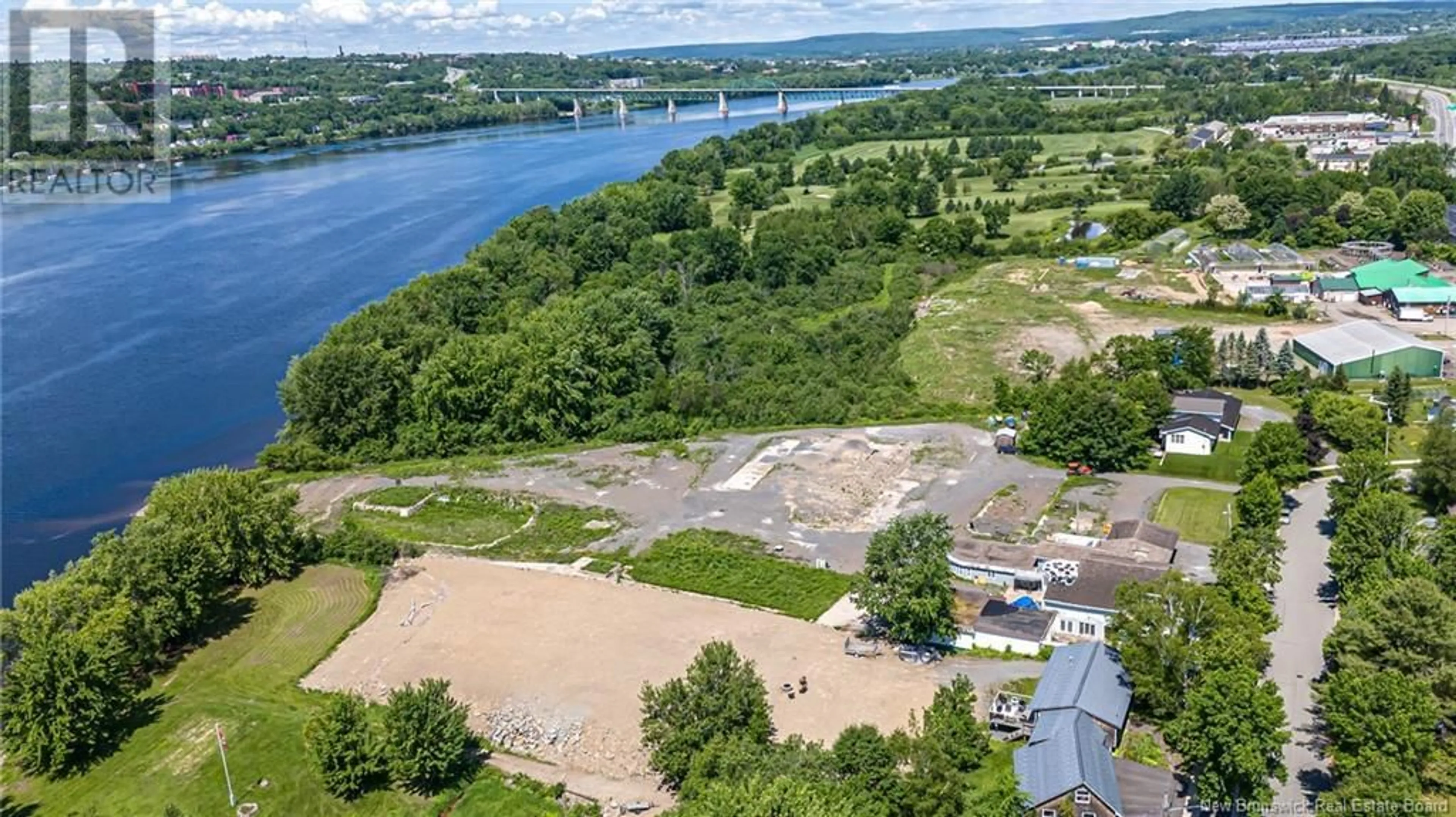 A pic from outside/outdoor area/front of a property/back of a property/a pic from drone, water/lake/river/ocean view for 59-69 ROSS TERRACE, Fredericton New Brunswick W3A8E5