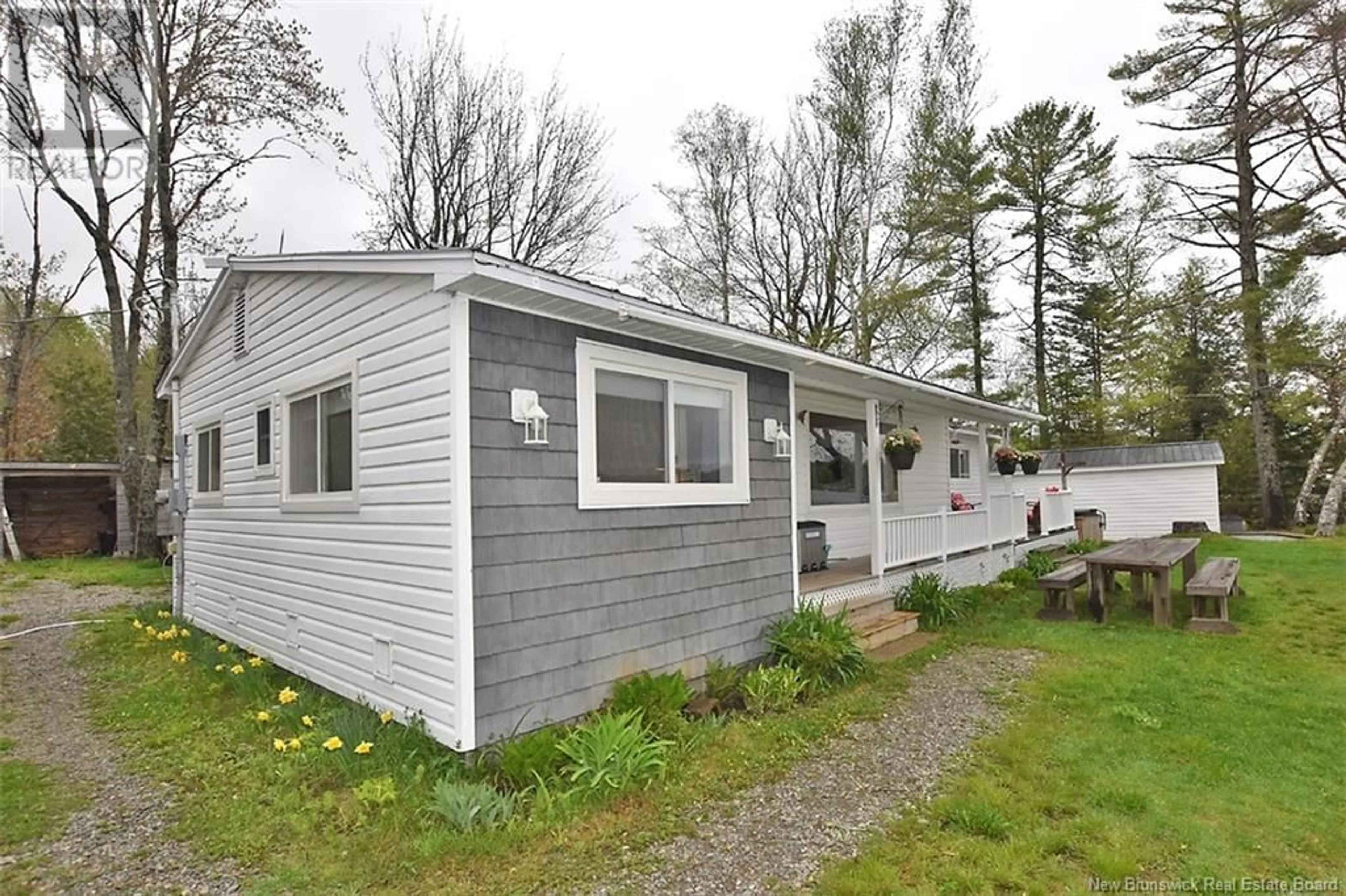 Home with vinyl exterior material, street for 42 SCOTT LANE, Dumfries New Brunswick E6G1T3