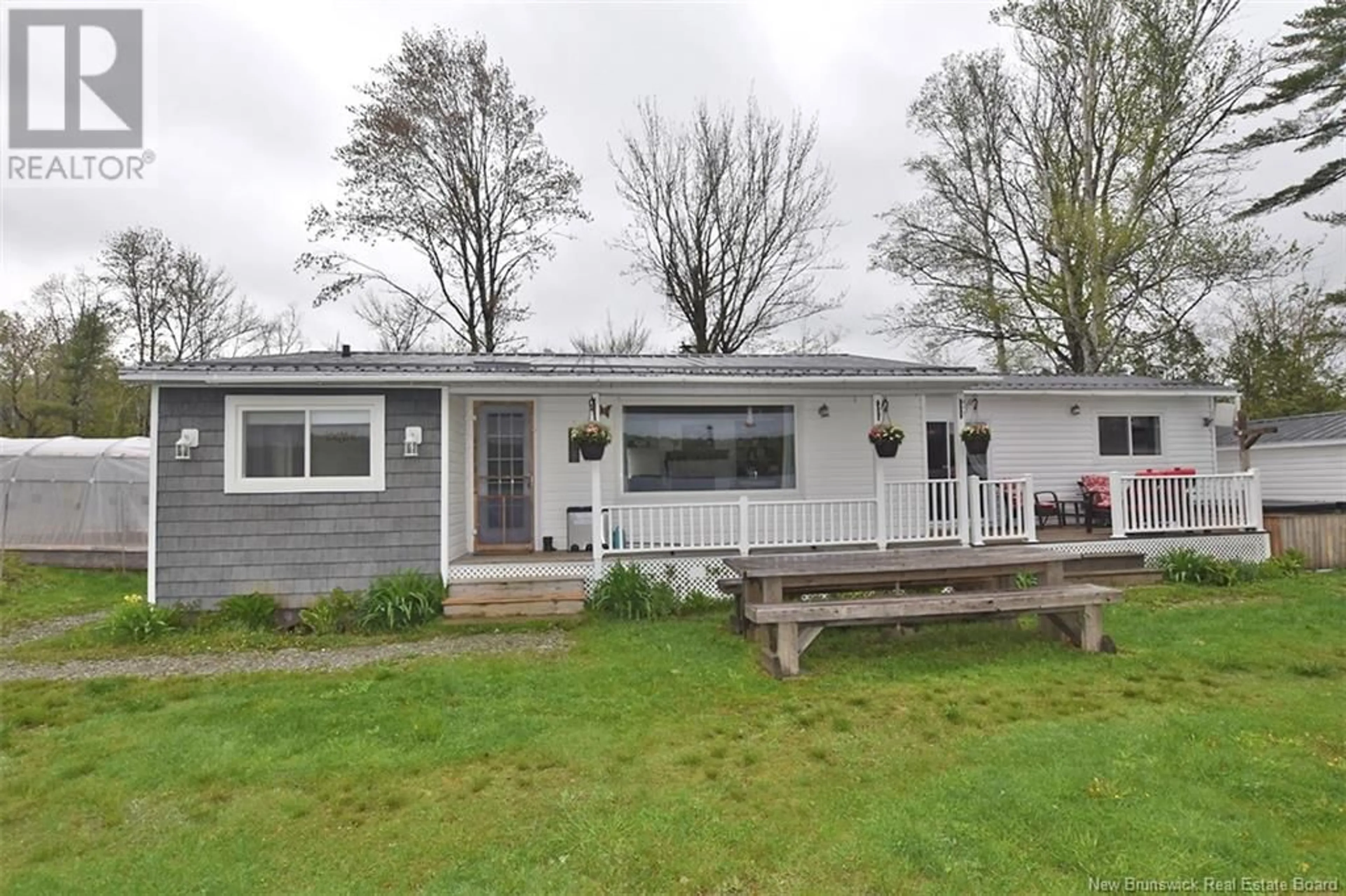 Home with vinyl exterior material, street for 42 SCOTT LANE, Dumfries New Brunswick E6G1T3