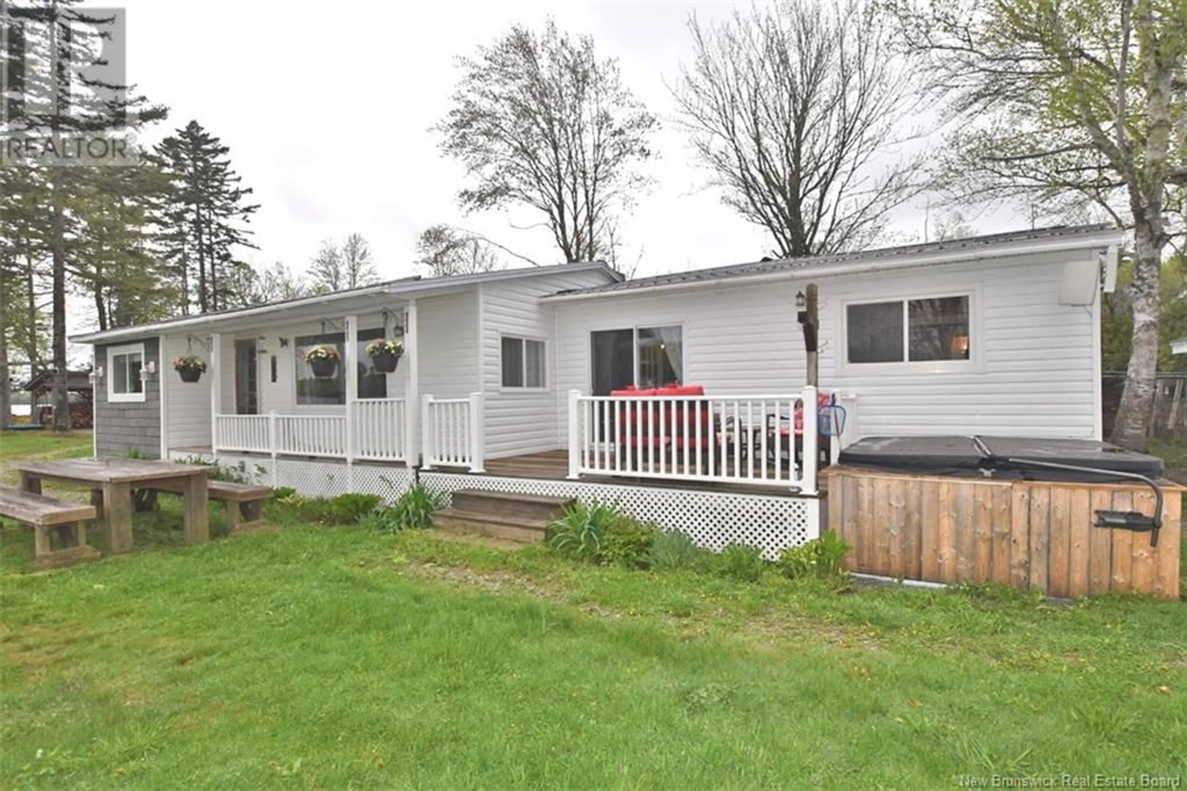 Home with vinyl exterior material, street for 42 SCOTT LANE, Dumfries New Brunswick E6G1T3