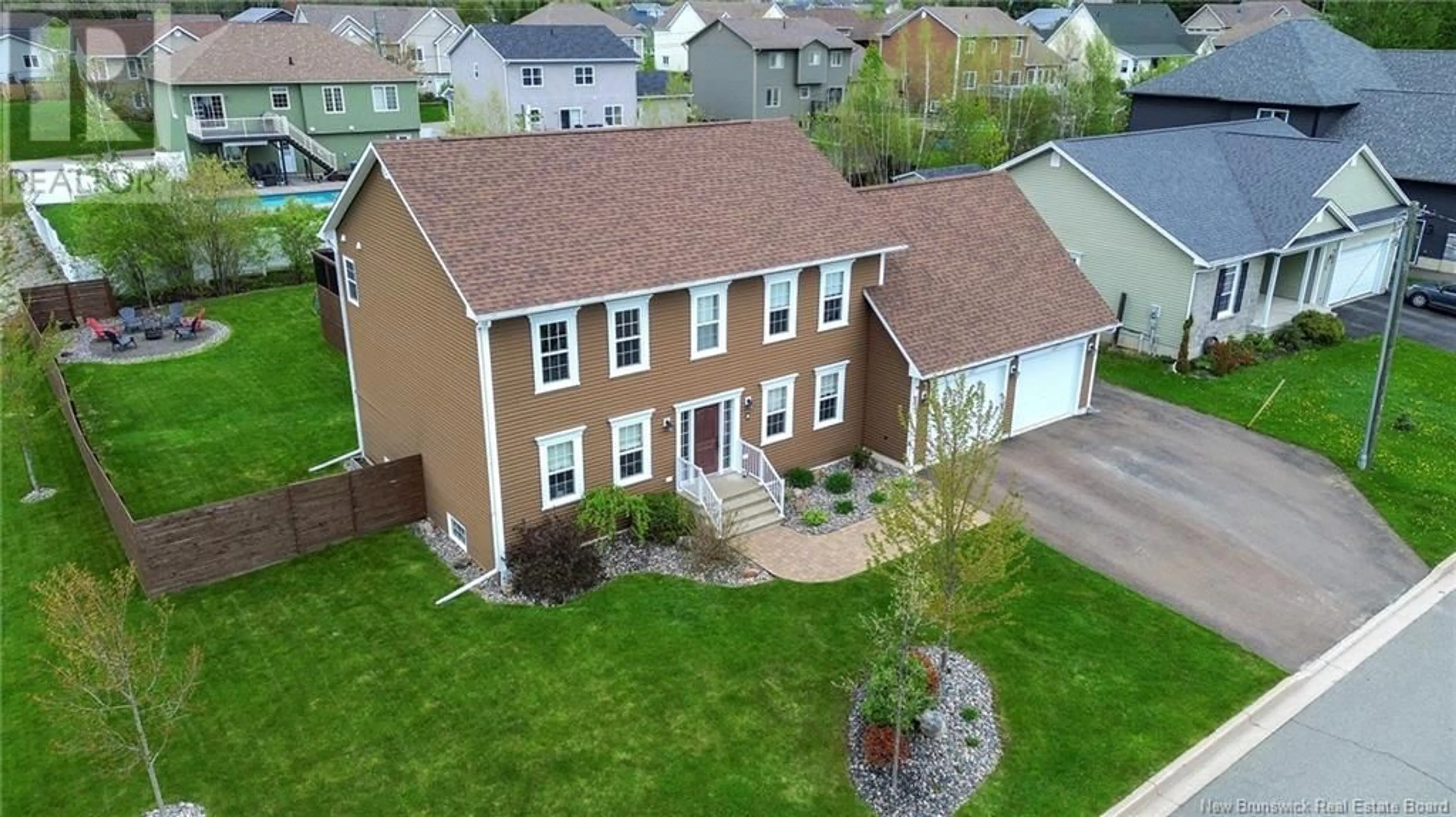 A pic from outside/outdoor area/front of a property/back of a property/a pic from drone, street for 5 LOUISE COURT, Fredericton New Brunswick E5G5M5