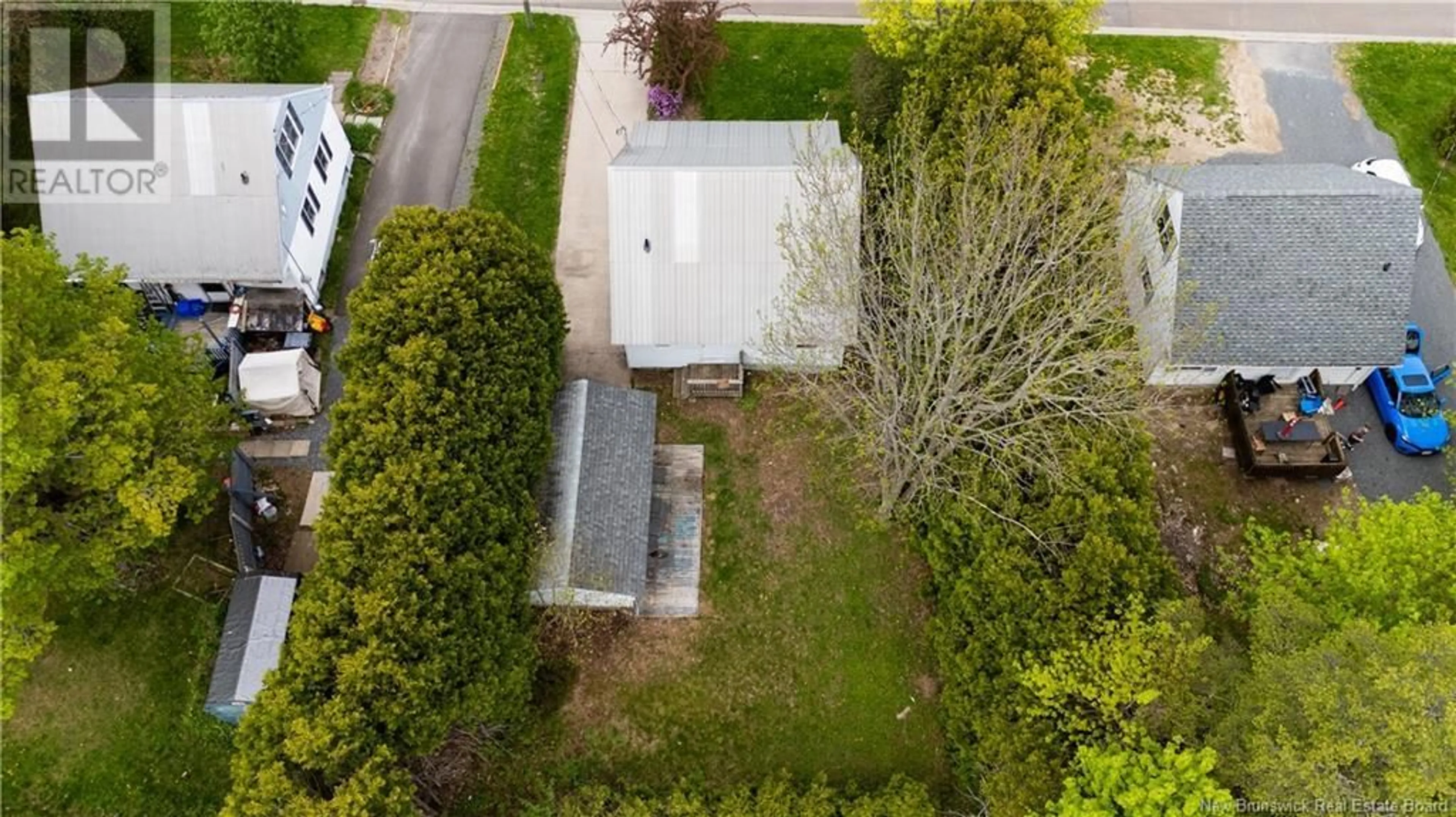 A pic from outside/outdoor area/front of a property/back of a property/a pic from drone, street for 618 REID STREET, Fredericton New Brunswick E3B3V5