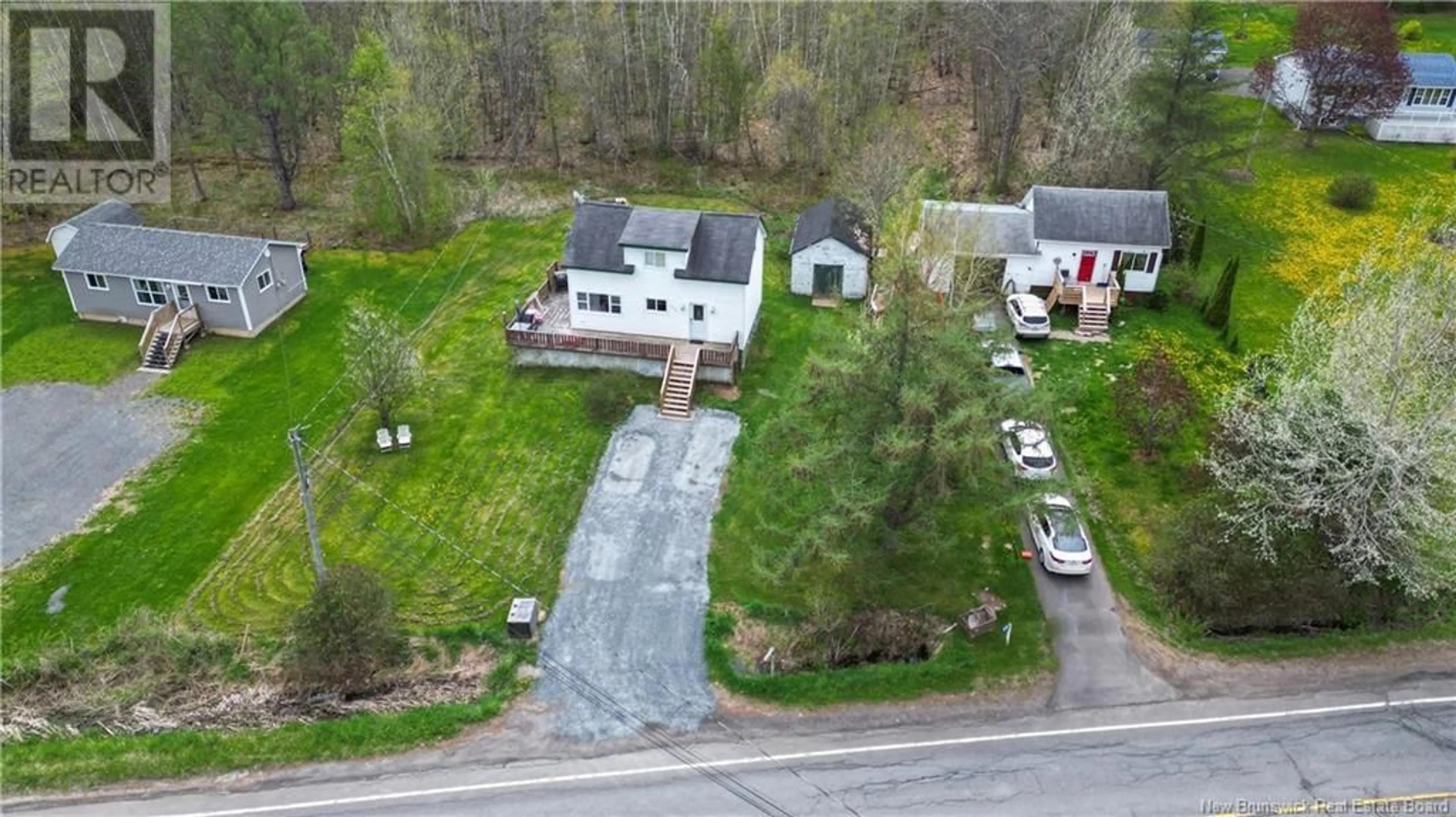 A pic from outside/outdoor area/front of a property/back of a property/a pic from drone, street for 454 102 ROUTE, Burton New Brunswick E2V3J9