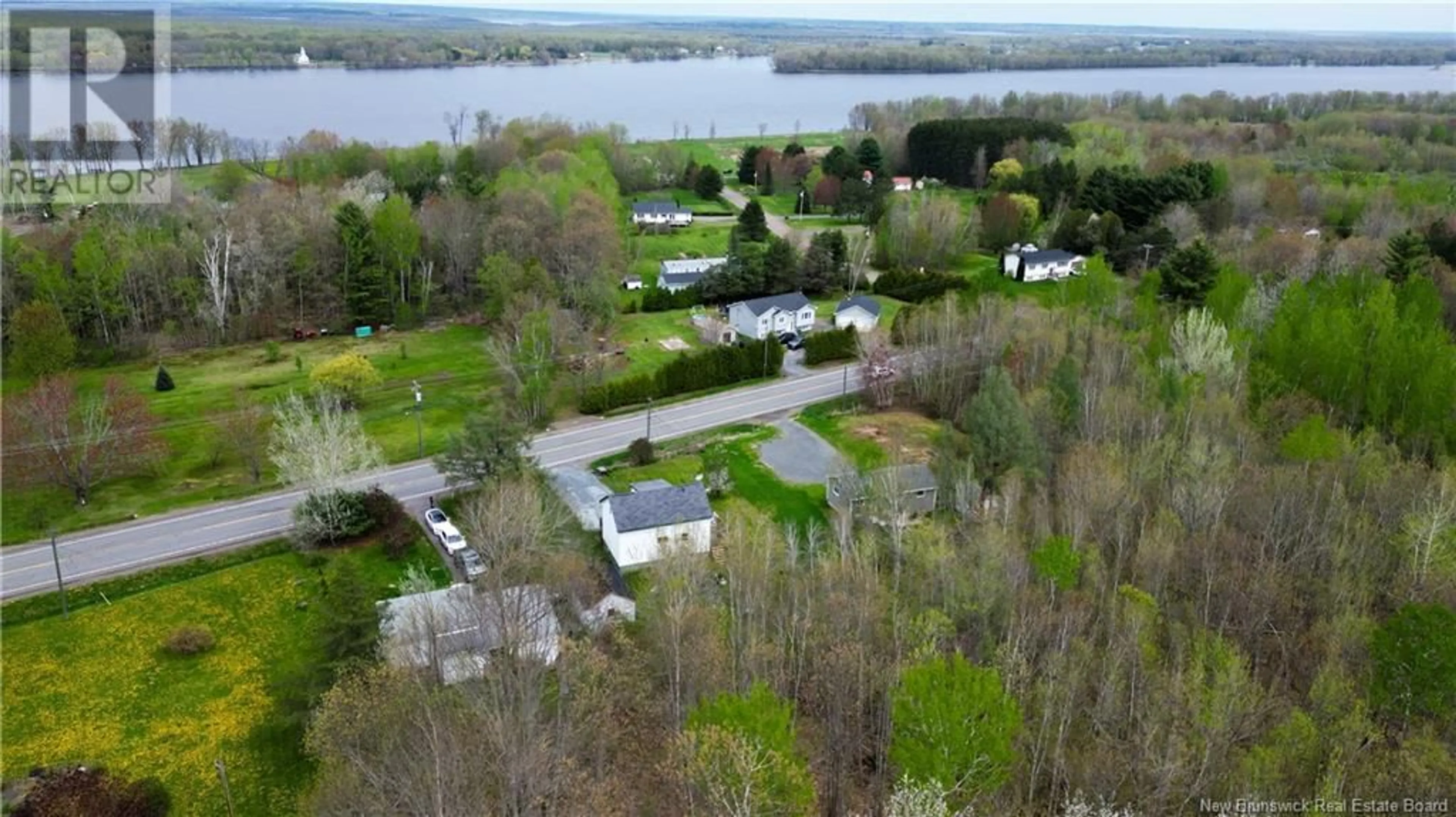 A pic from outside/outdoor area/front of a property/back of a property/a pic from drone, water/lake/river/ocean view for 454 102 ROUTE, Burton New Brunswick E2V3J9