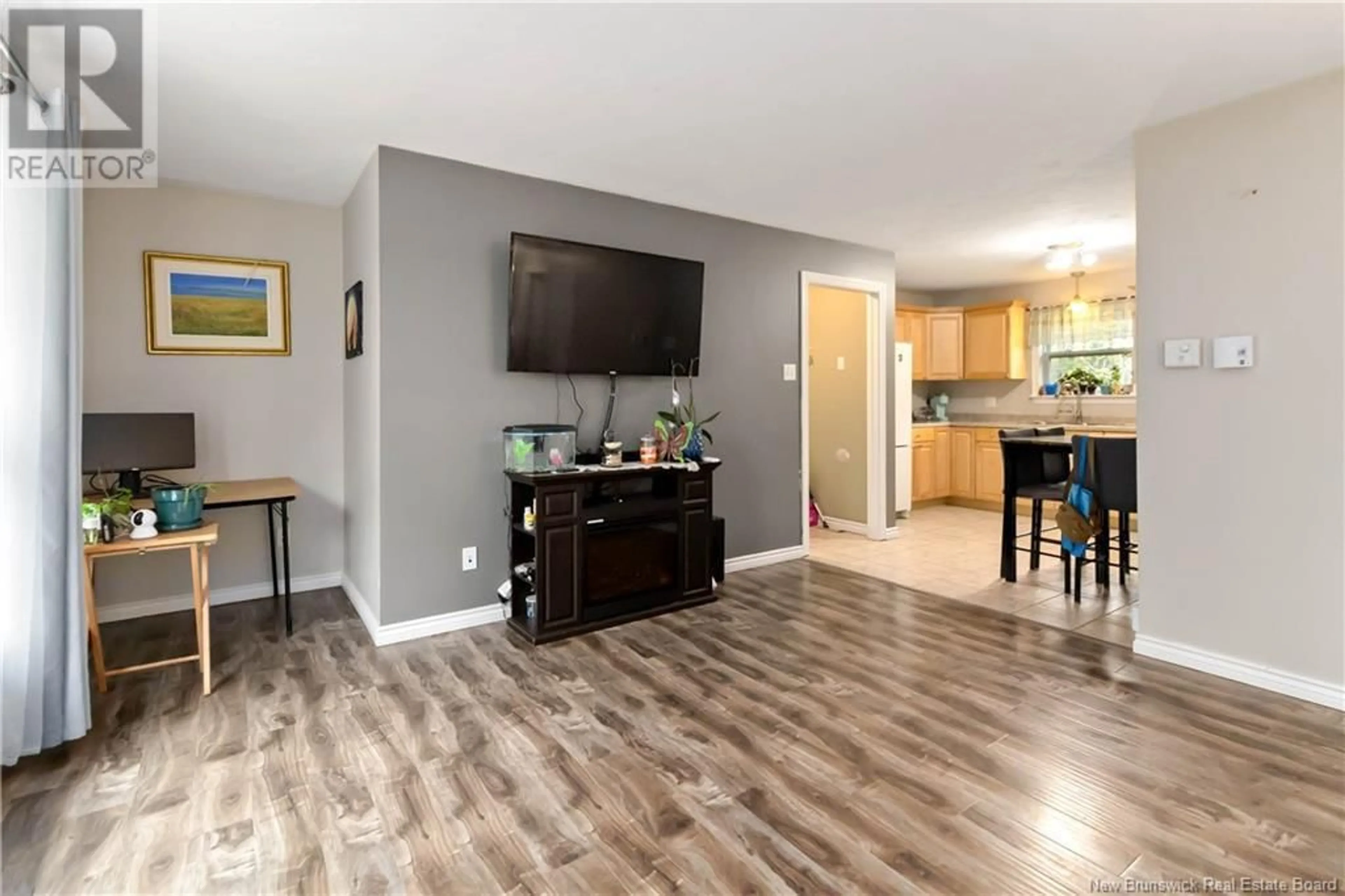 Open concept kitchen, wood/laminate floor for 268 CAPE BRETON ROAD, Irishtown New Brunswick E1H1W8