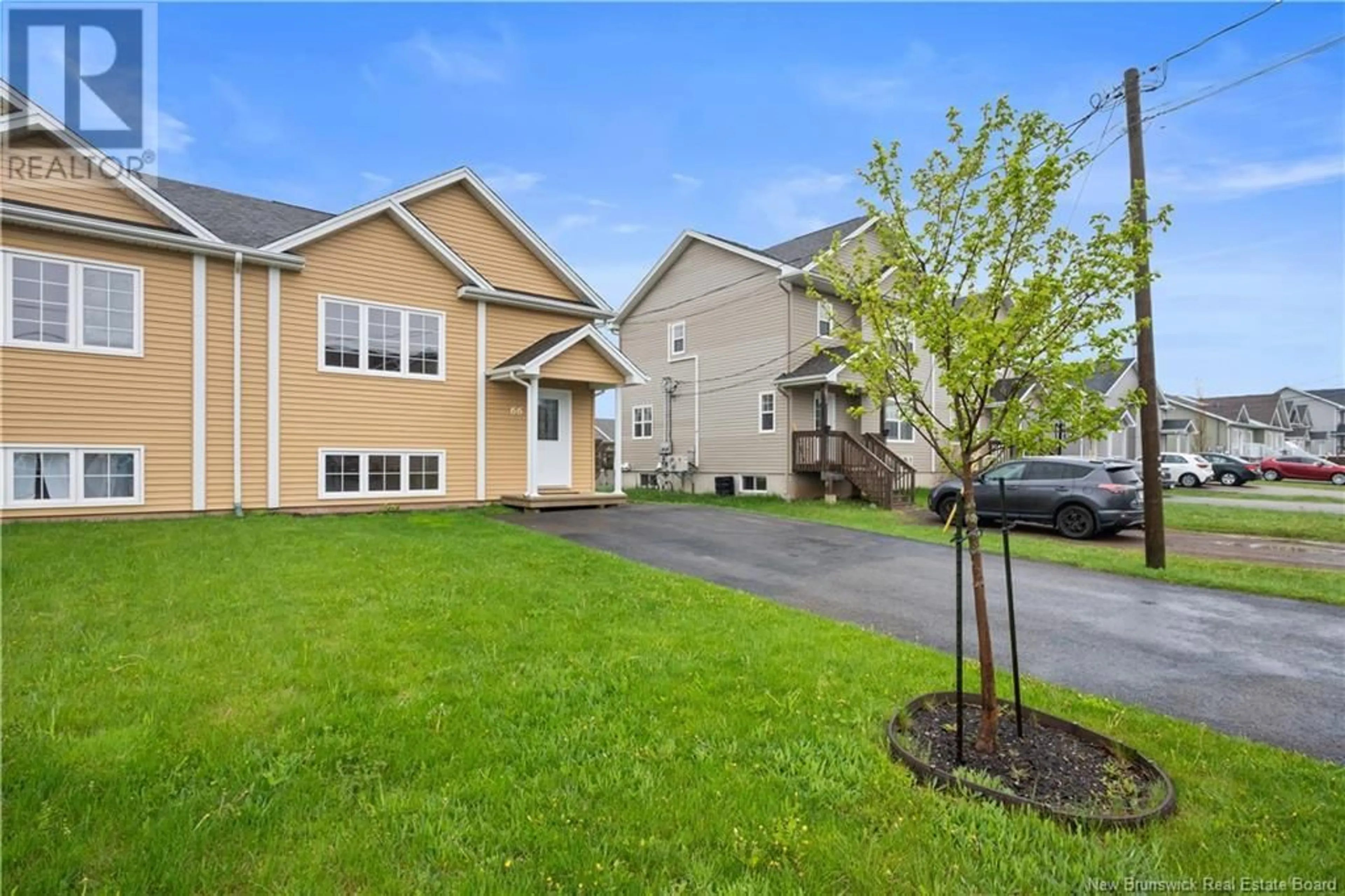 Home with vinyl exterior material, street for 66 GAMBIA STREET, Moncton New Brunswick E1G5T1