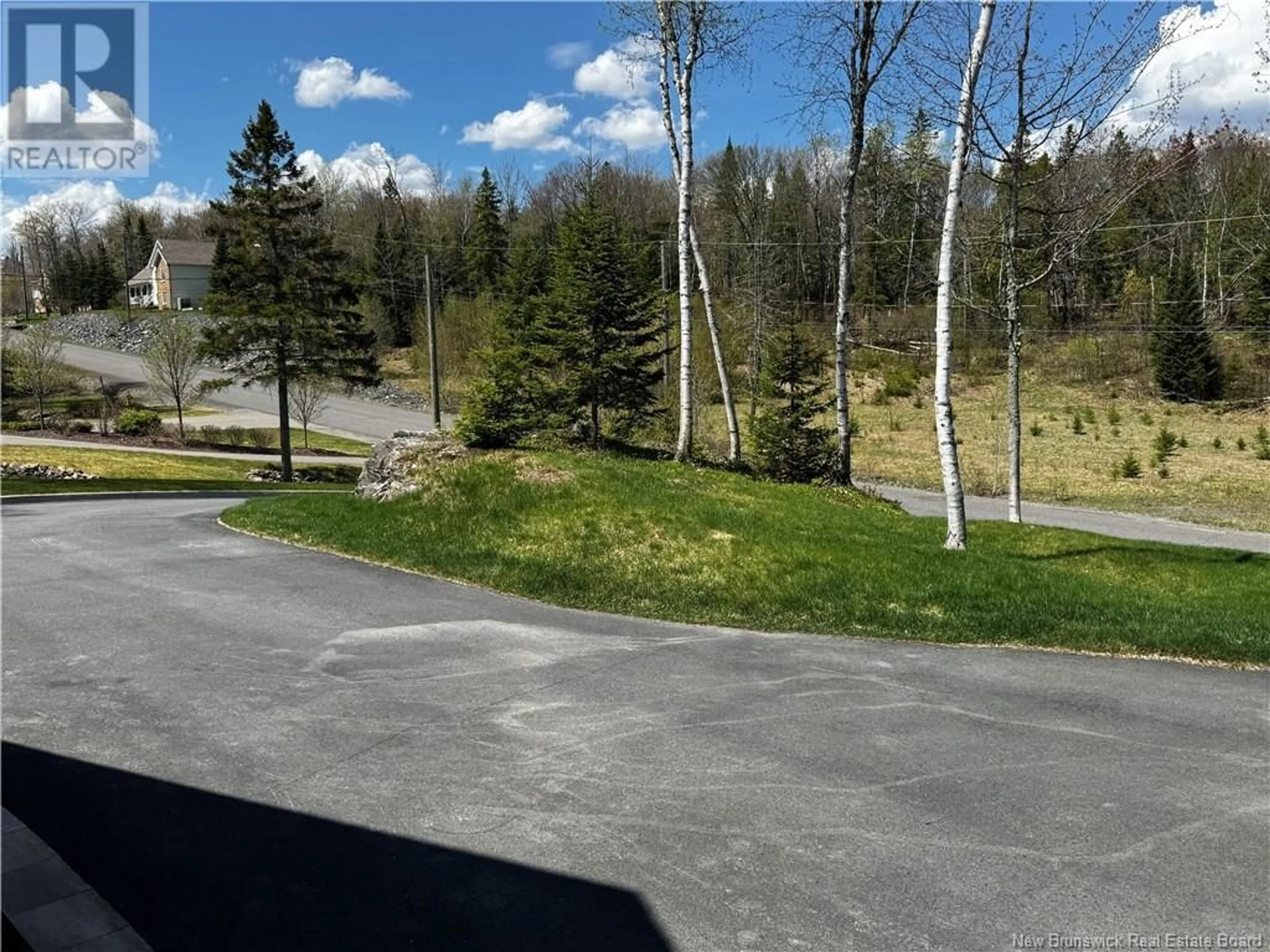 A pic from outside/outdoor area/front of a property/back of a property/a pic from drone, forest/trees view for 34 DE LA FALAISE STREET, Edmundston New Brunswick E3V0C4