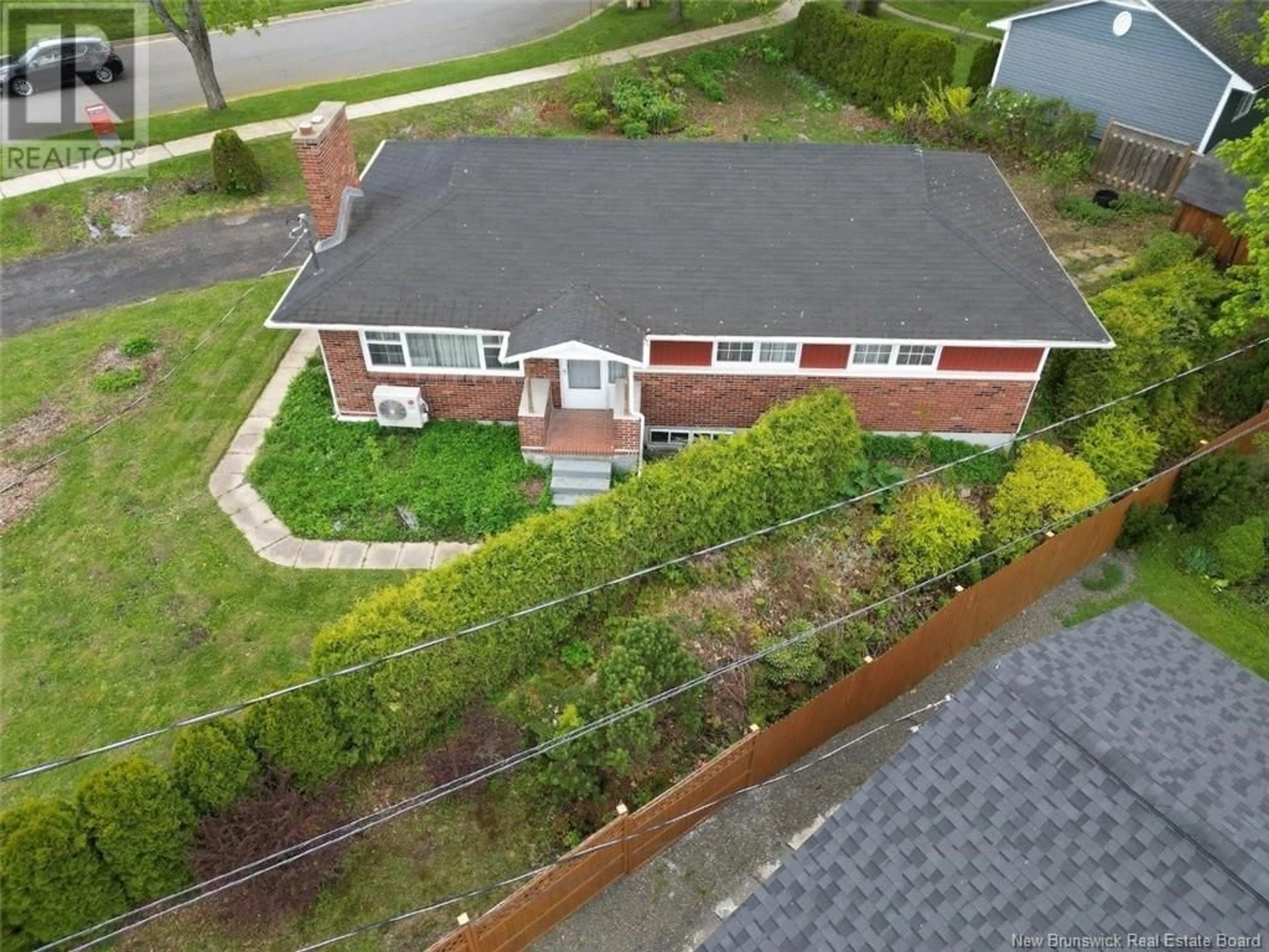 A pic from outside/outdoor area/front of a property/back of a property/a pic from drone, street for 831 HANSON STREET, Fredericton New Brunswick E3B4A1