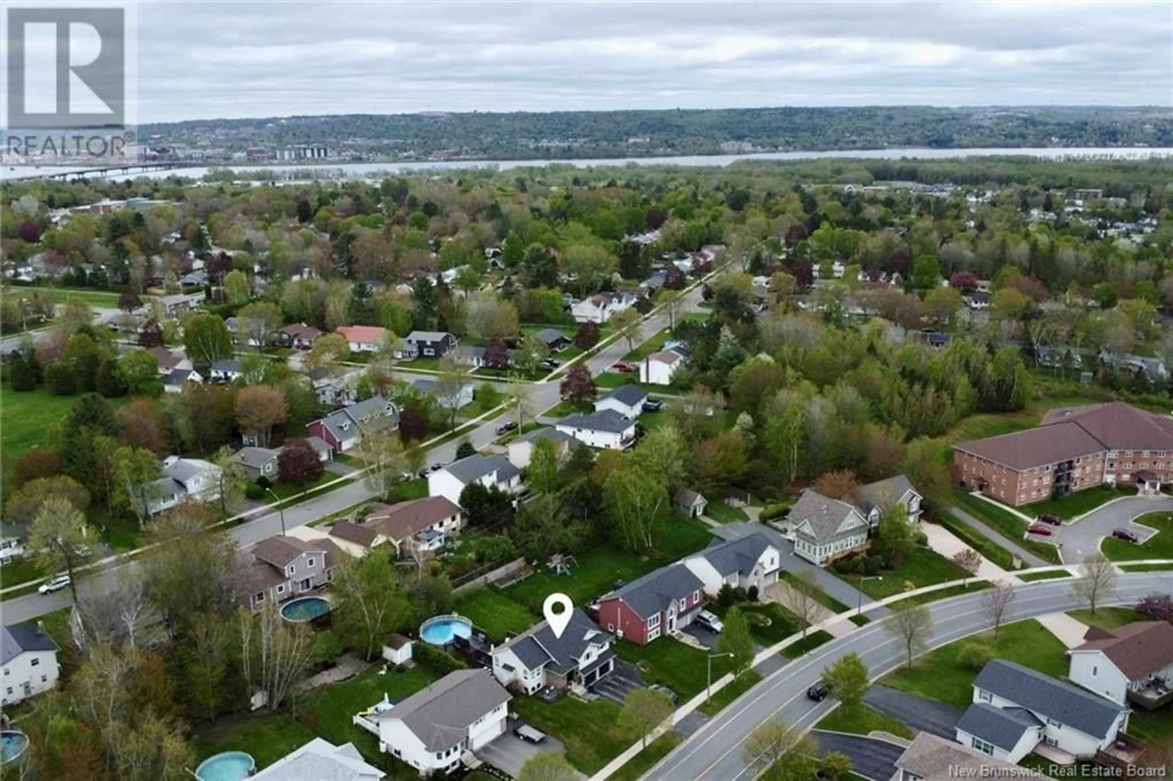 A pic from outside/outdoor area/front of a property/back of a property/a pic from drone, unknown for 989 DOUGLAS AVENUE, Fredericton New Brunswick E3A9M8