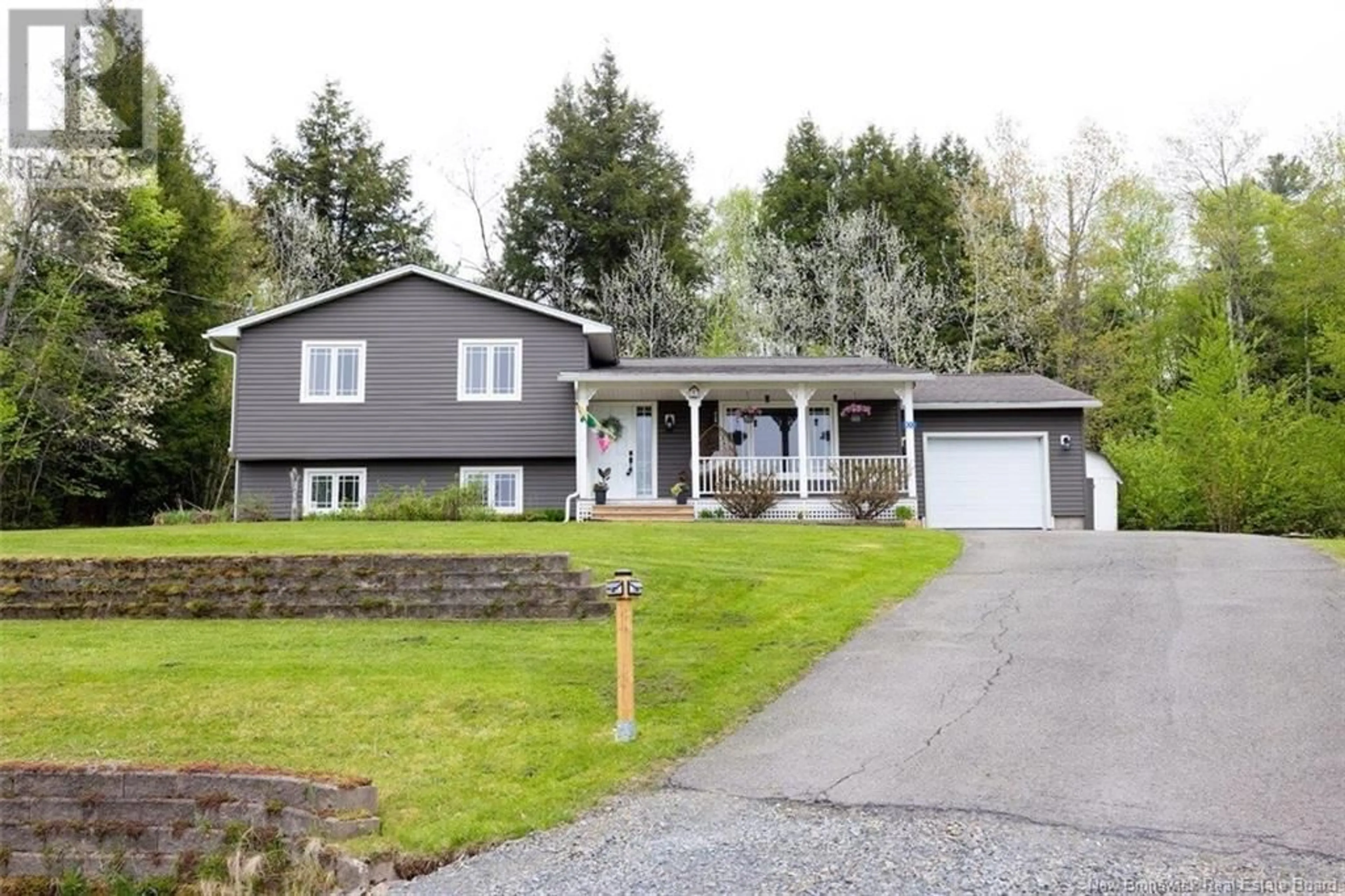 Home with vinyl exterior material, street for 100 DEBBIE LANE, Richibucto Road New Brunswick E3A6T9