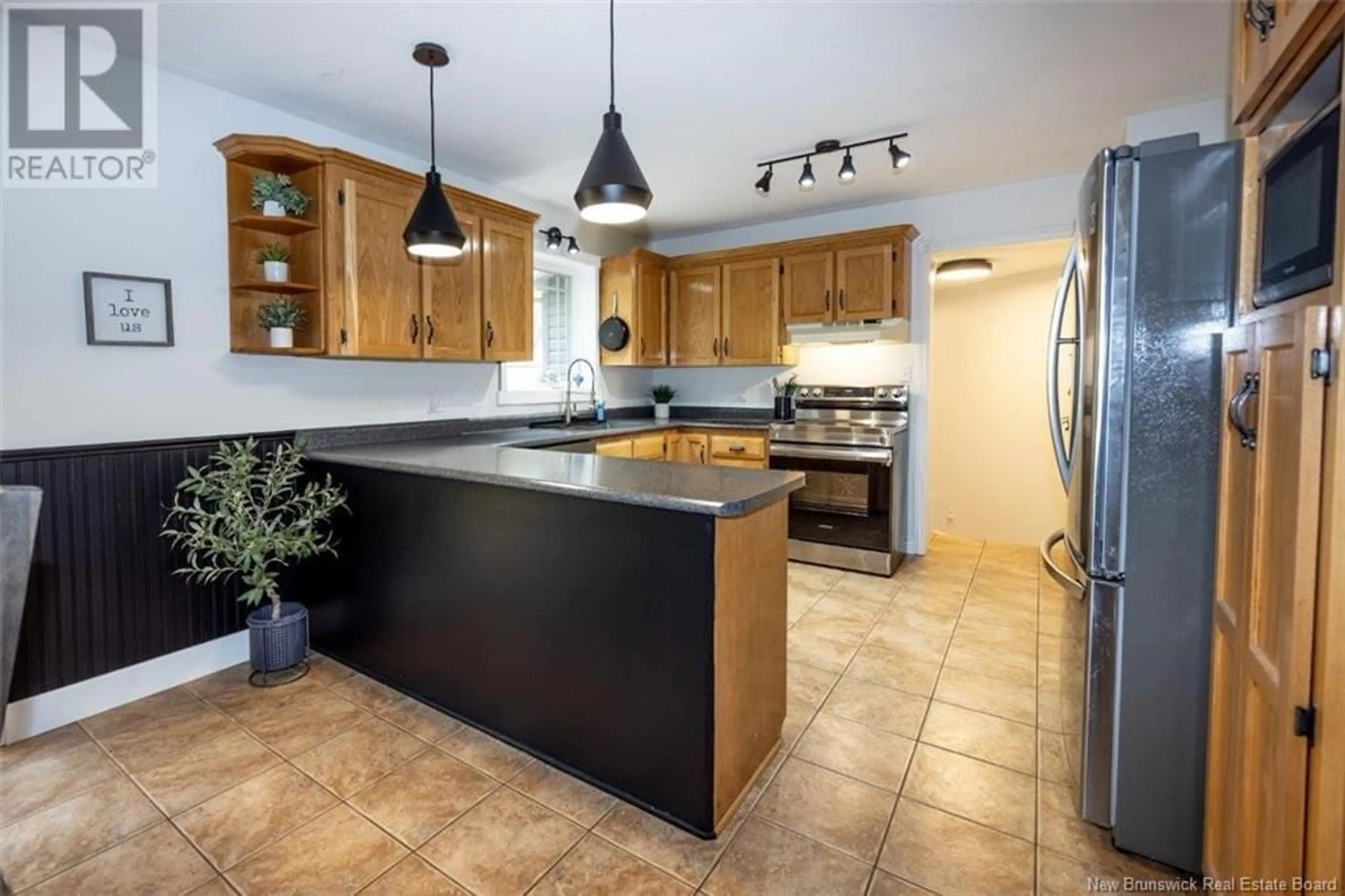 Open concept kitchen, ceramic/tile floor for 100 DEBBIE LANE, Richibucto Road New Brunswick E3A6T9