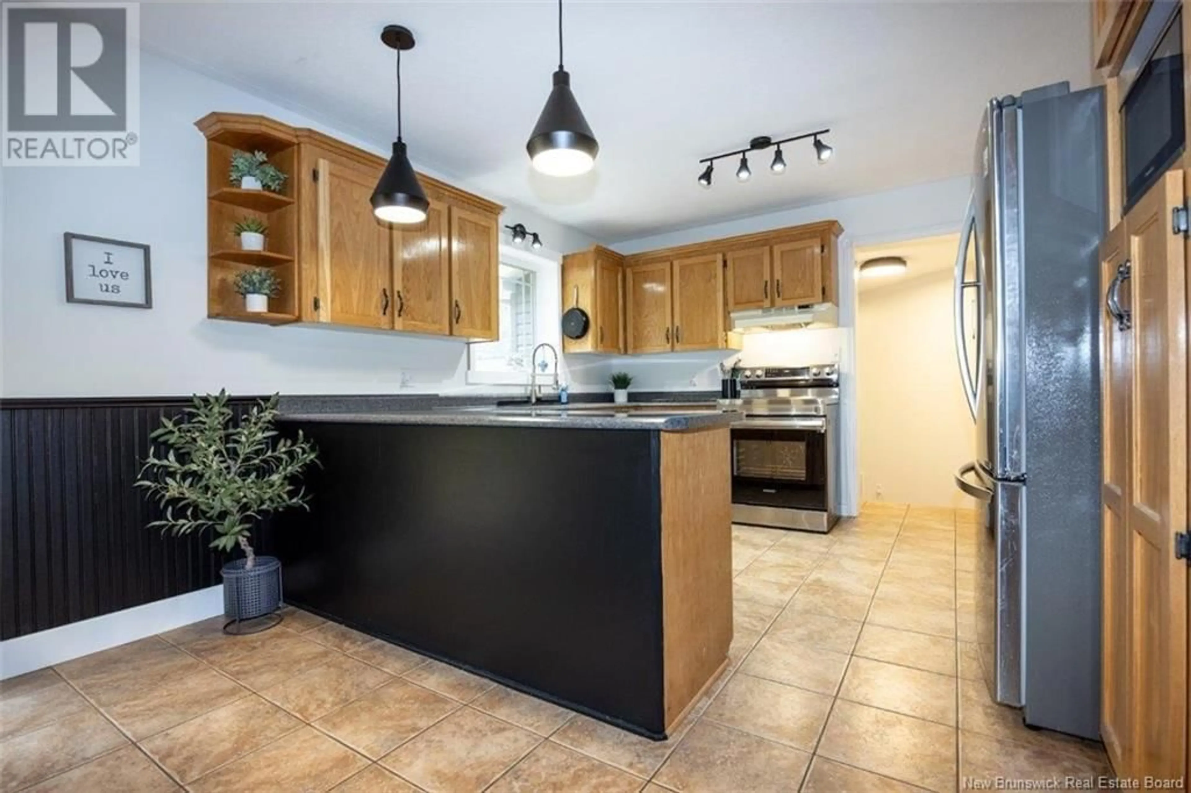 Open concept kitchen, ceramic/tile floor for 100 DEBBIE LANE, Richibucto Road New Brunswick E3A6T9