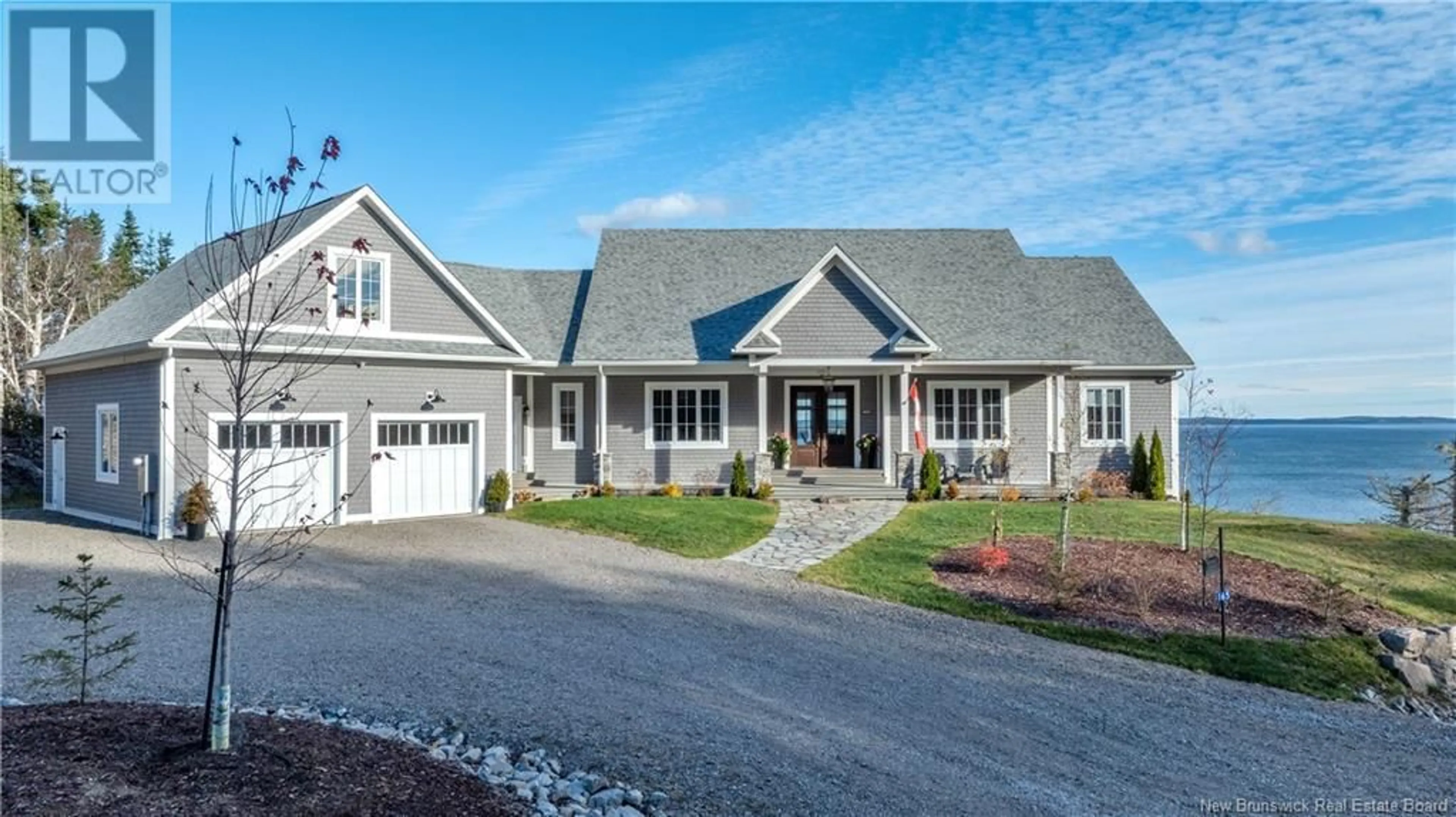 Home with vinyl exterior material, street for 165 OCEAN WAY, Chamcook New Brunswick E5B0A7