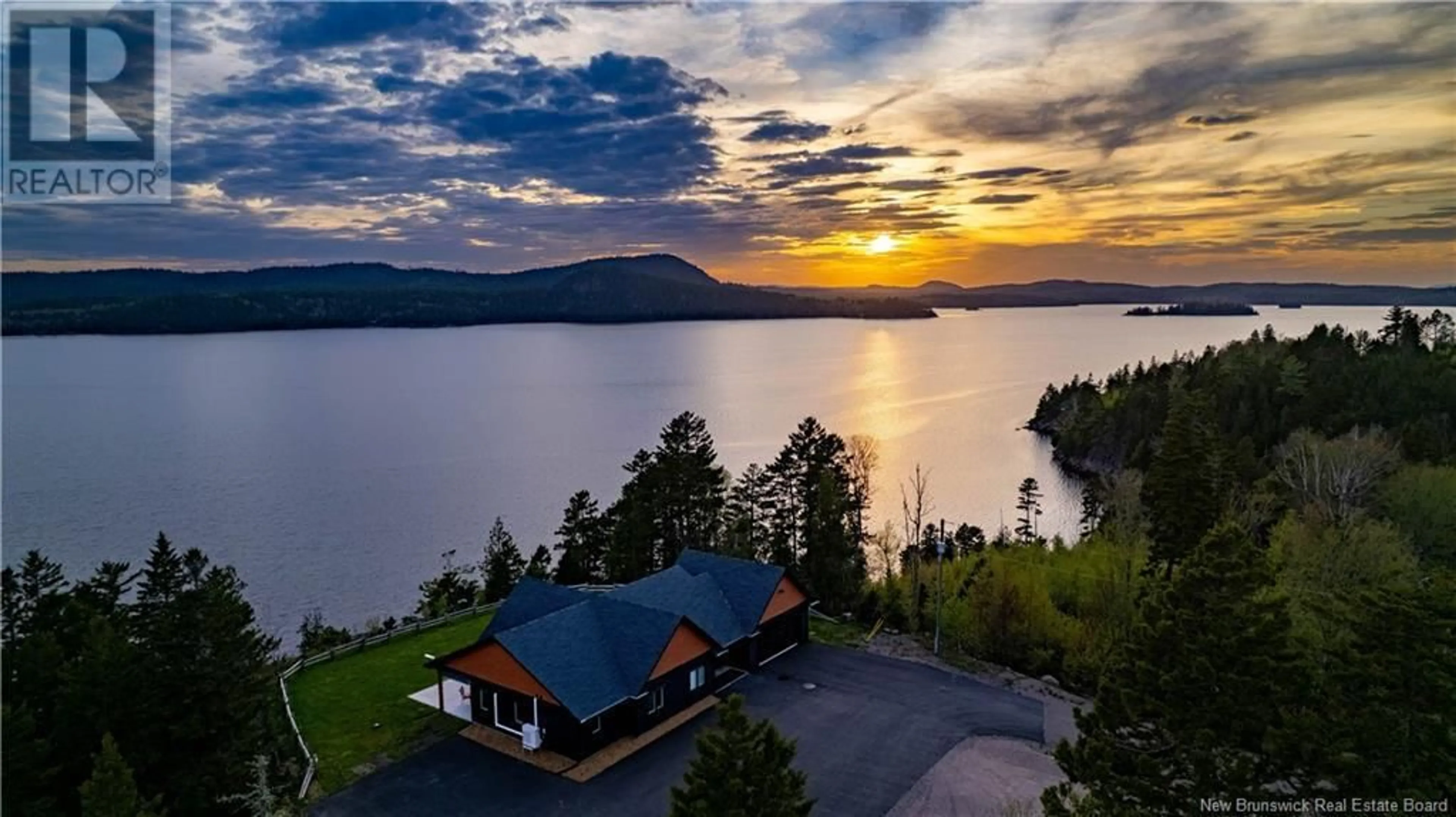 A pic from outside/outdoor area/front of a property/back of a property/a pic from drone, water/lake/river/ocean view for 15 BLUFF ROAD, Utopia New Brunswick E5C0J4