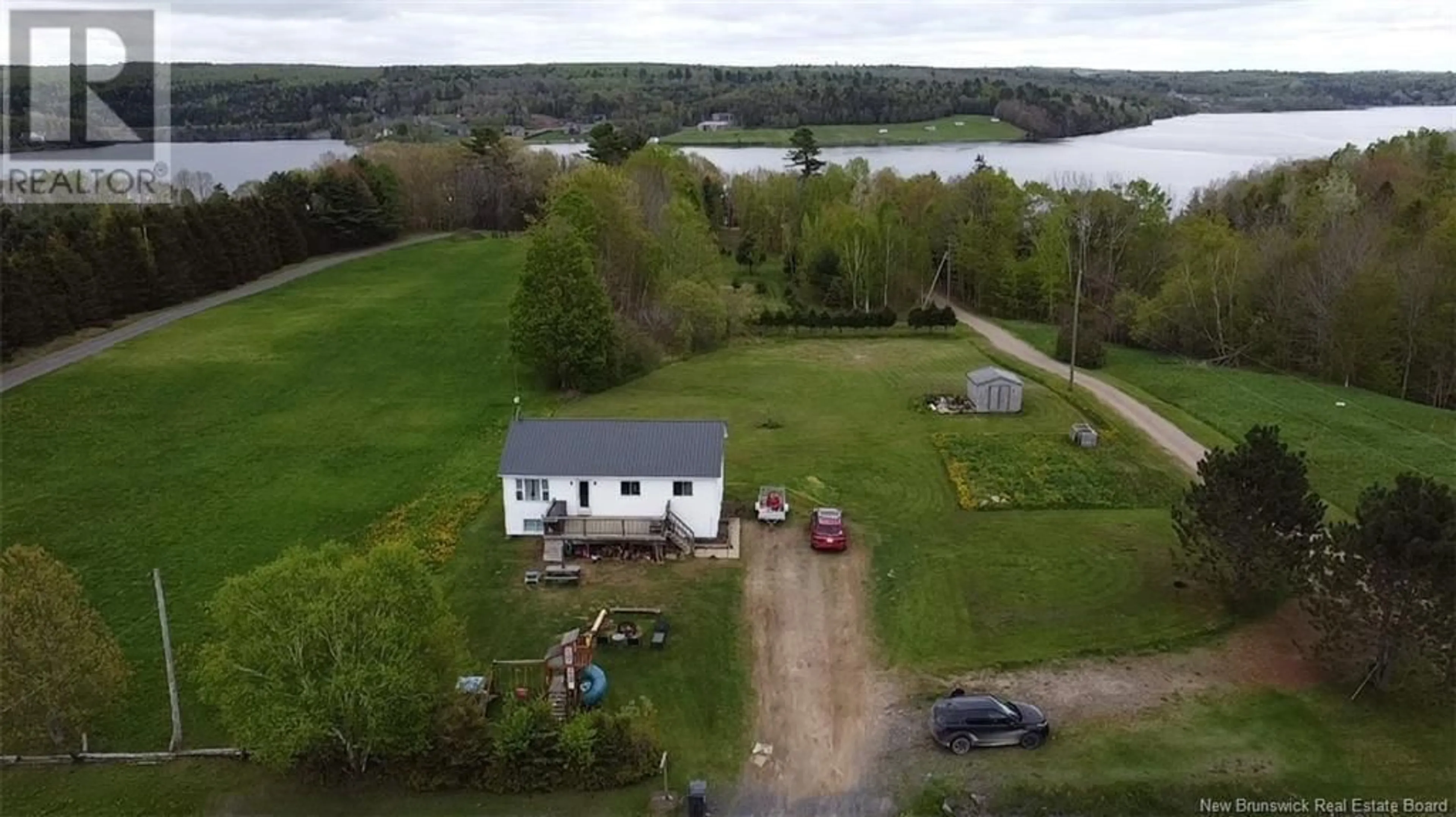 A pic from outside/outdoor area/front of a property/back of a property/a pic from drone, water/lake/river/ocean view for 1707 105 ROUTE, Mactaquac New Brunswick E6L1C4