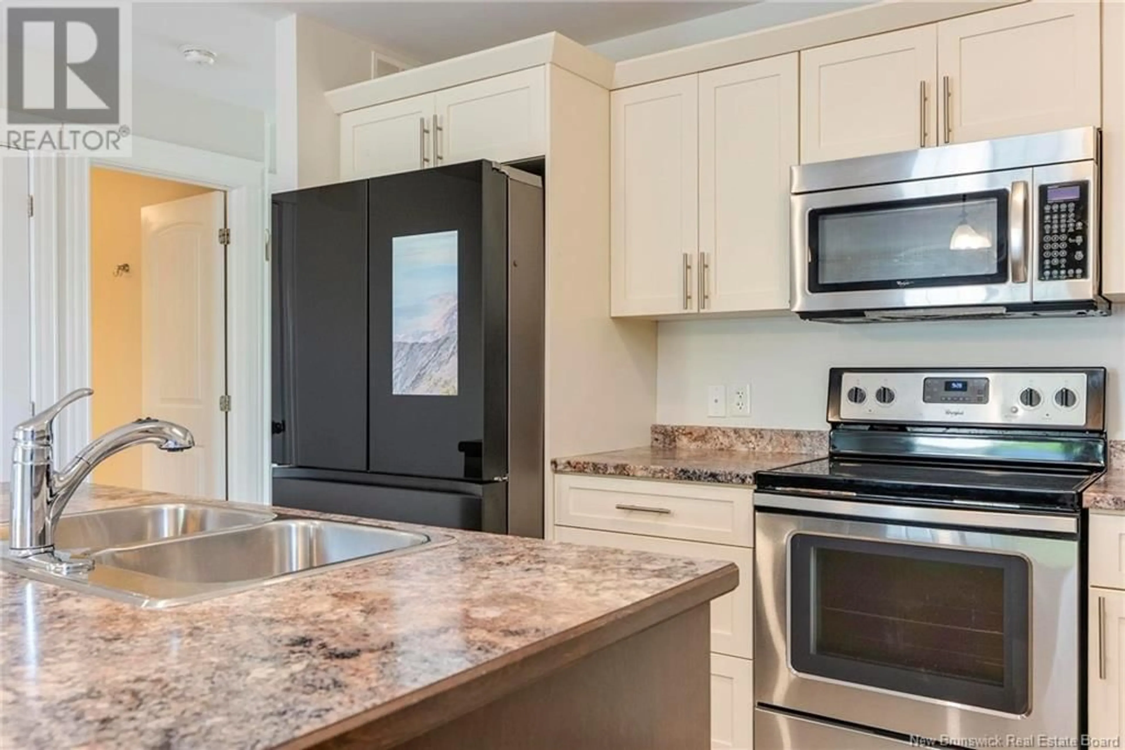 Open concept kitchen, ceramic/tile floor for 801 HILLCREST DRIVE, Fredericton New Brunswick E3A5K7