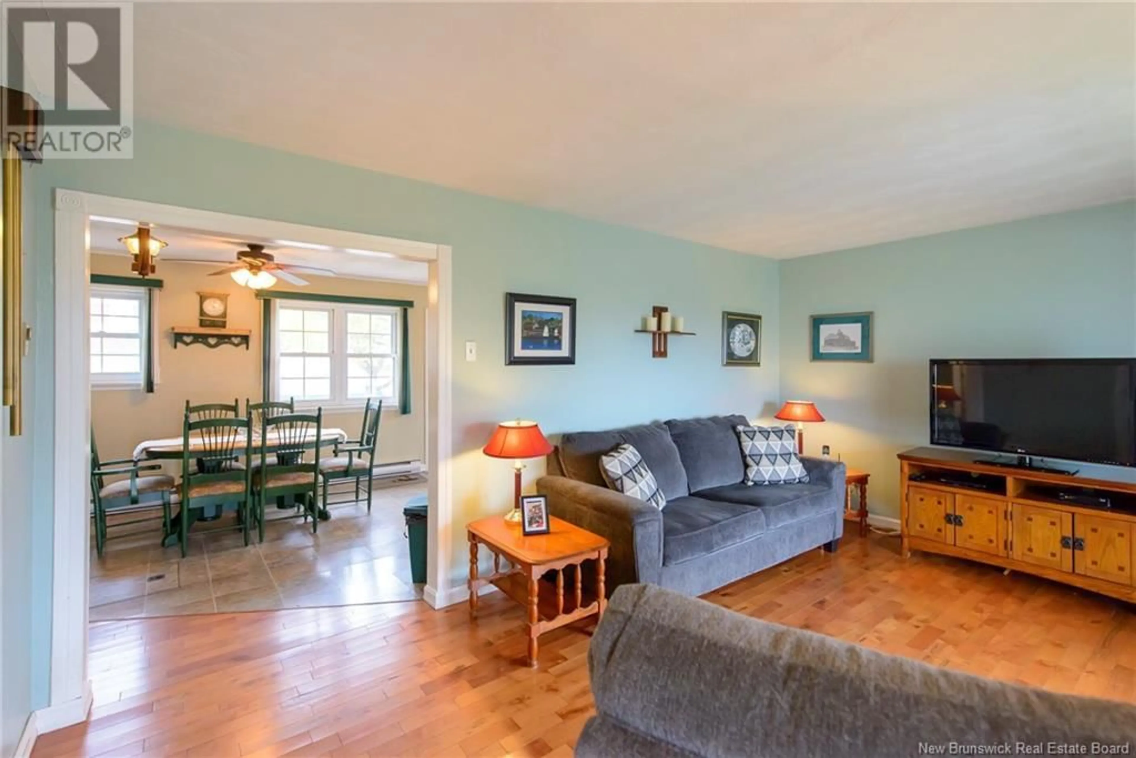 Living room with furniture, wood/laminate floor for 63 CITY LINE, Saint John New Brunswick E2M1K9