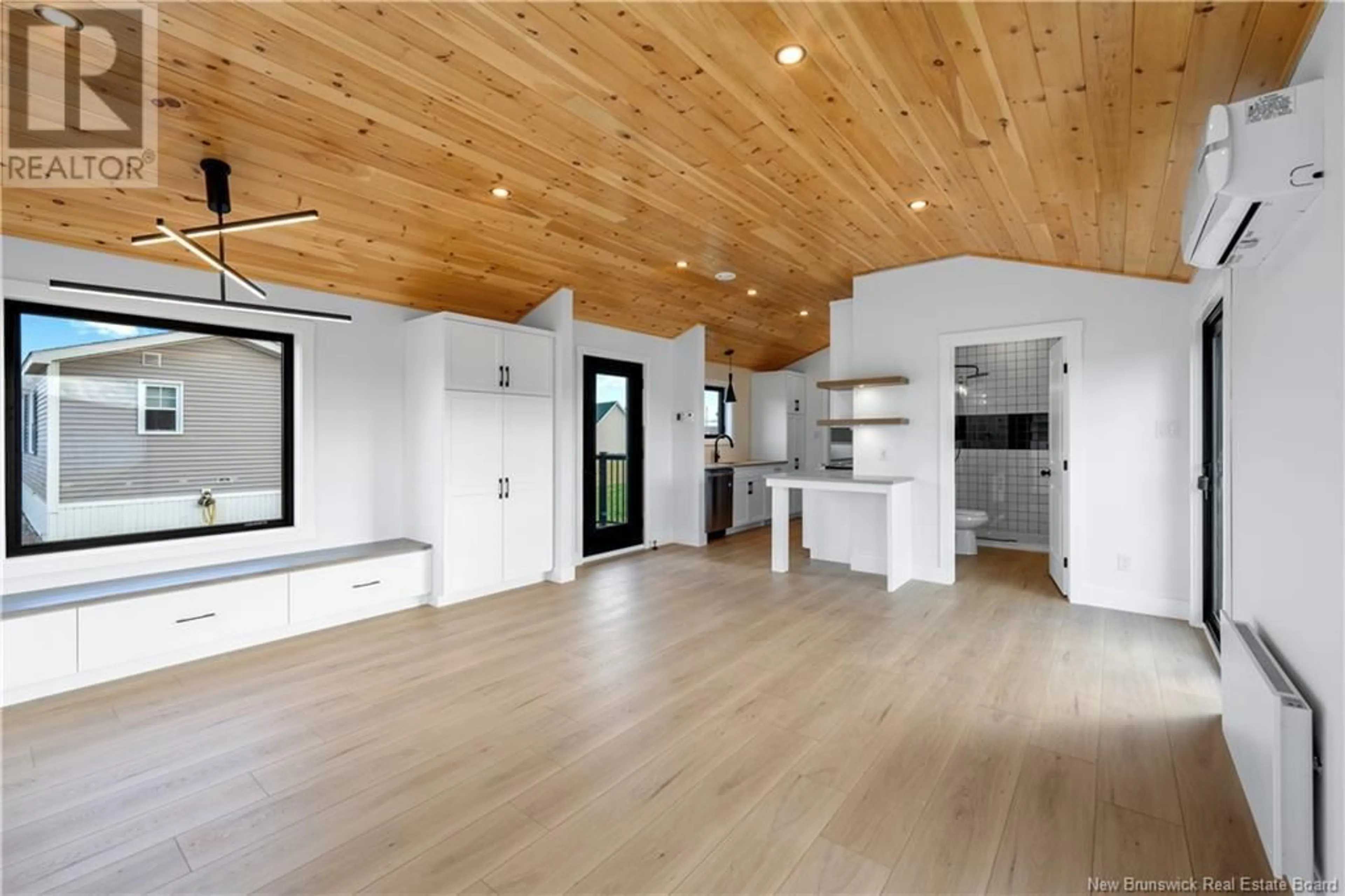Open concept kitchen, wood/laminate floor for 14 BEDECHE STREET, Cap-Pelé New Brunswick E4N0G1