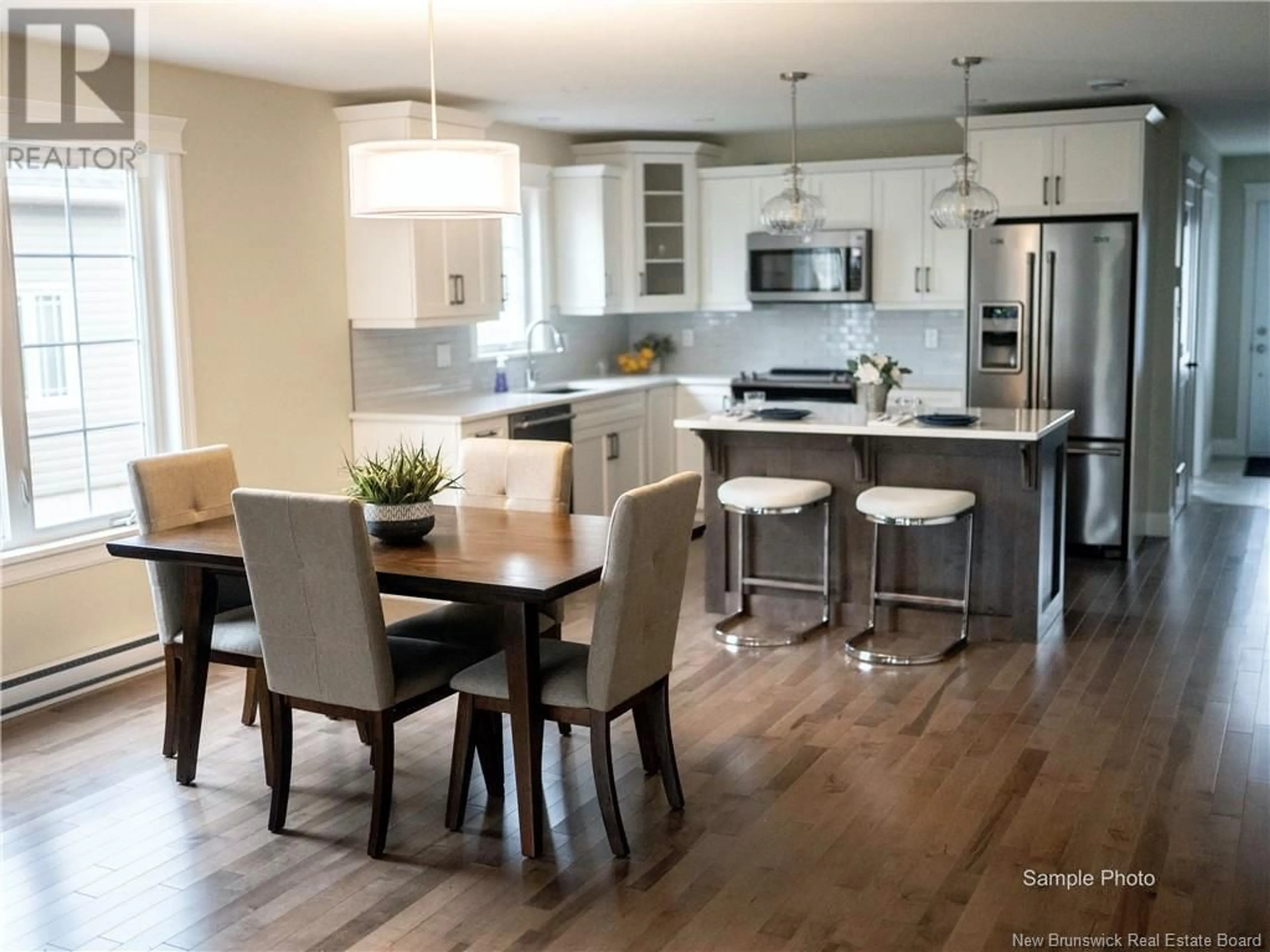 Open concept kitchen, wood/laminate floor for 25 LEAVERY STREET, Fredericton New Brunswick E3G5V6