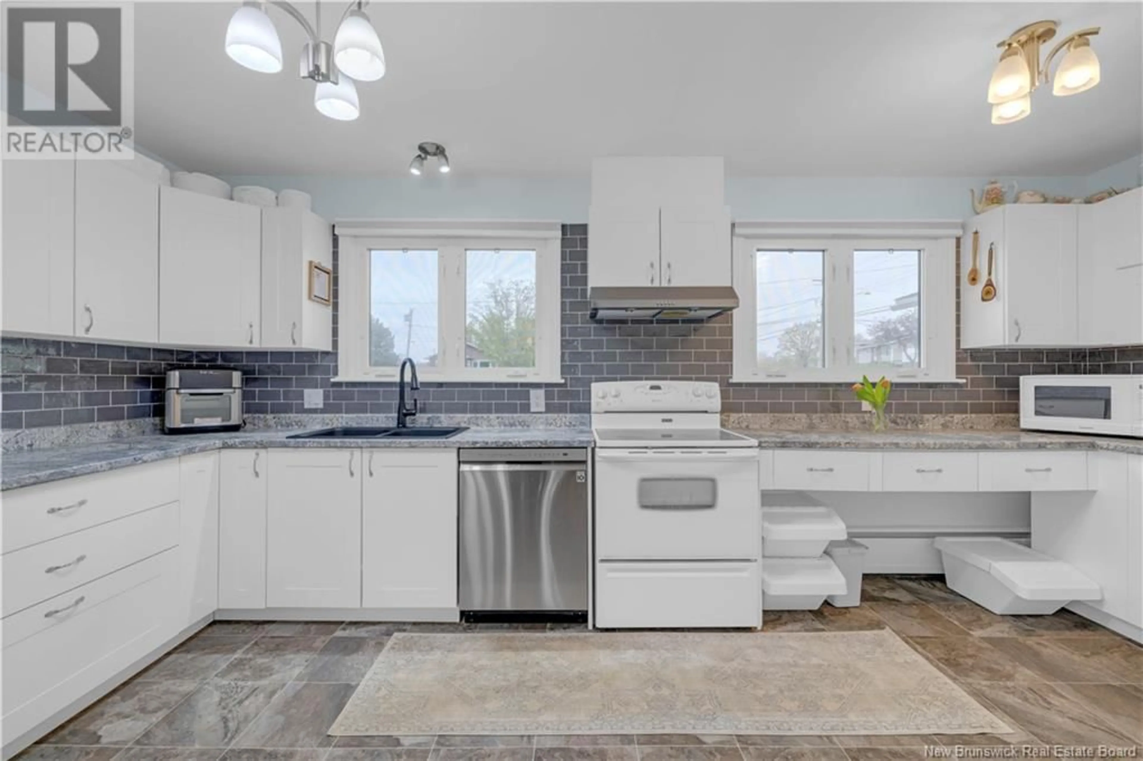 Open concept kitchen, ceramic/tile floor for 36 SCHOFIELD COURT, Saint John New Brunswick E2K2B3