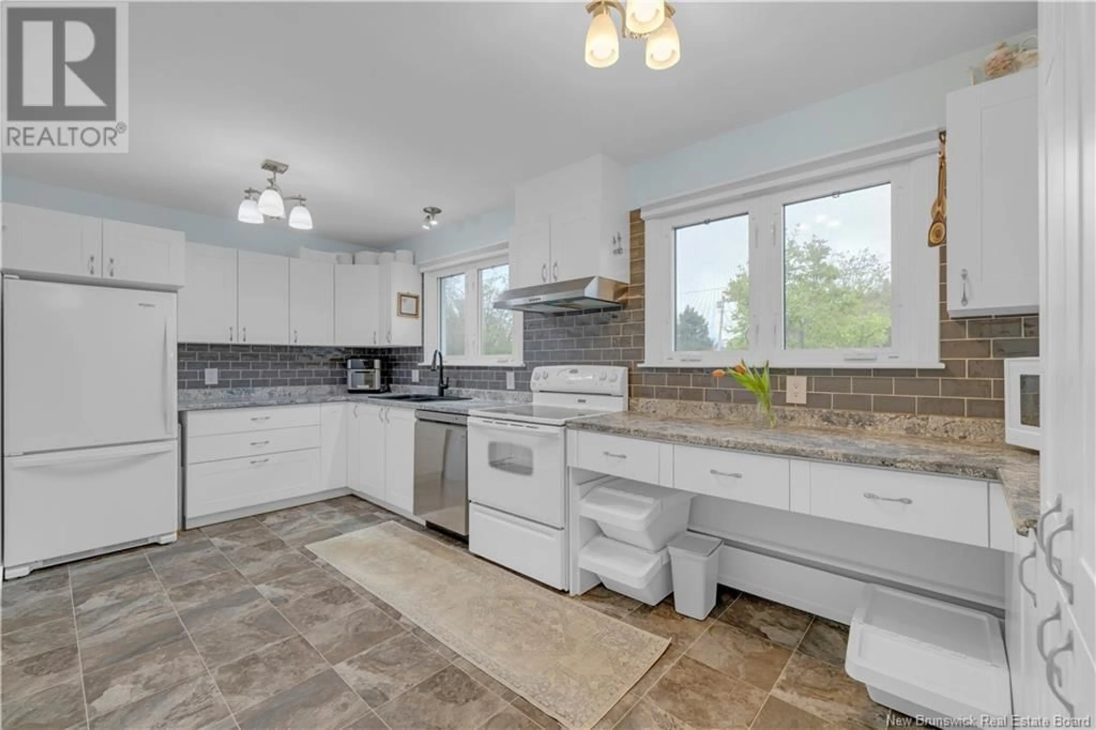 Open concept kitchen, ceramic/tile floor for 36 SCHOFIELD COURT, Saint John New Brunswick E2K2B3
