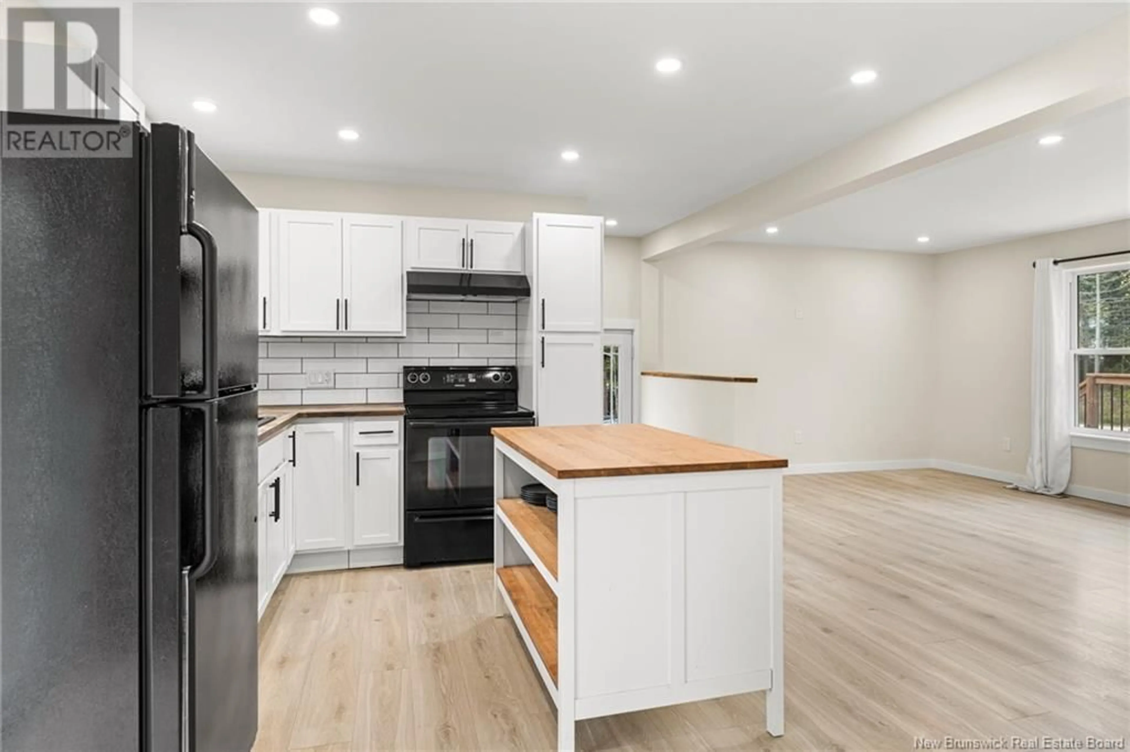 Open concept kitchen, wood/laminate floor for 2057 ROUTE 112, Upper Coverdale New Brunswick E1J1Z5