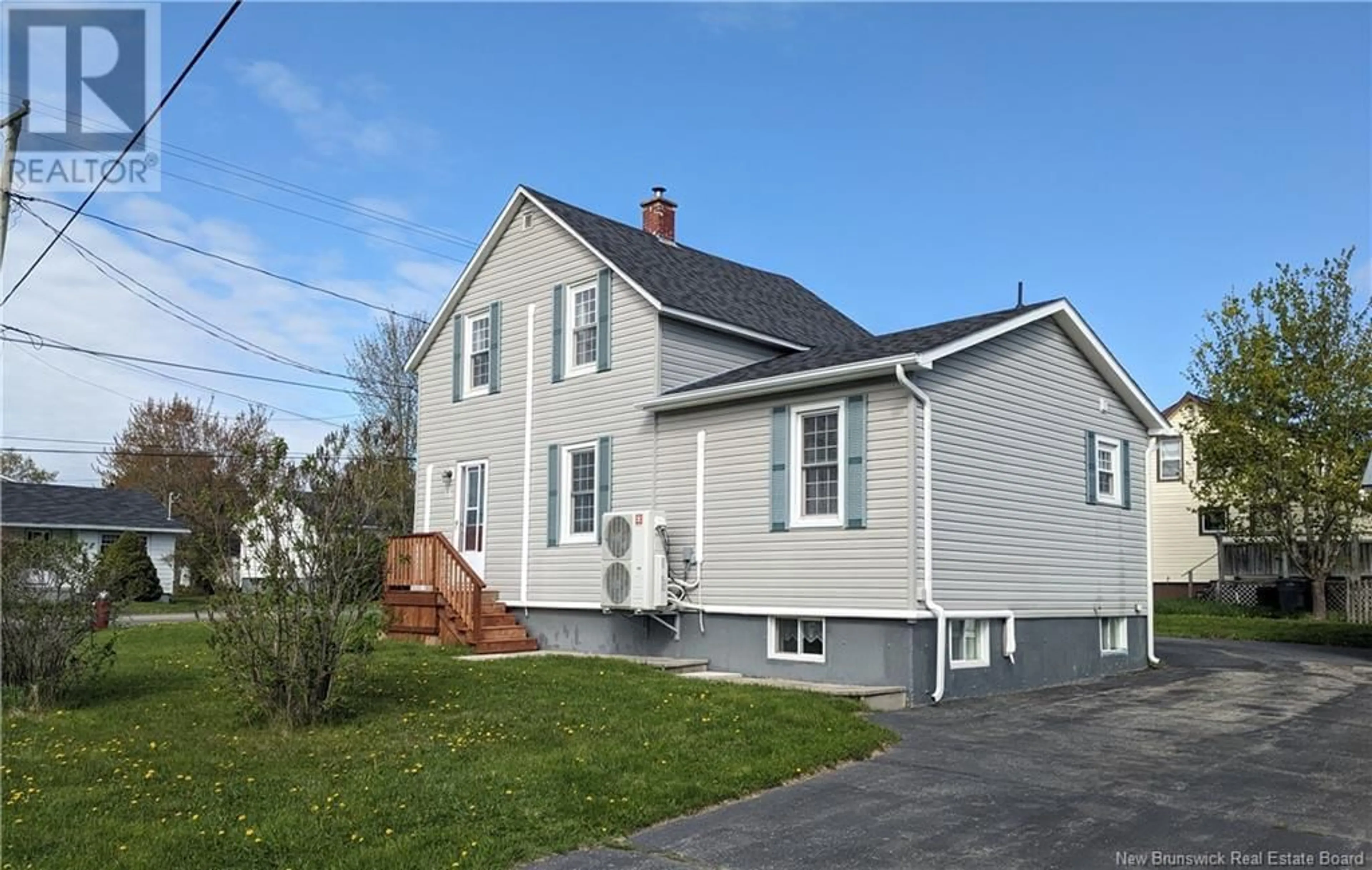 Home with vinyl exterior material, street for 51 ELIZABETH STREET, Miramichi New Brunswick E1V1W1