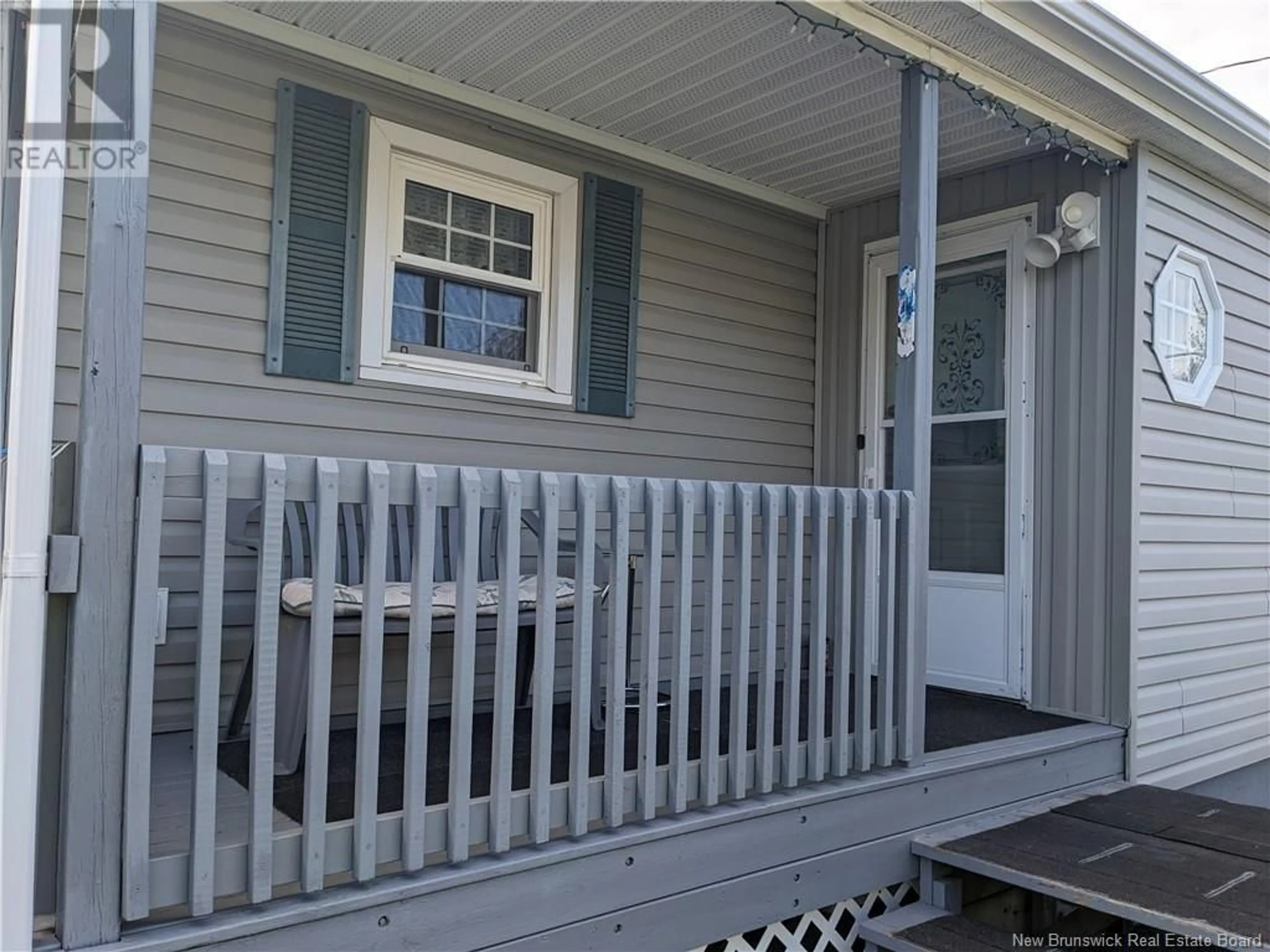 Home with vinyl exterior material, street for 51 ELIZABETH STREET, Miramichi New Brunswick E1V1W1