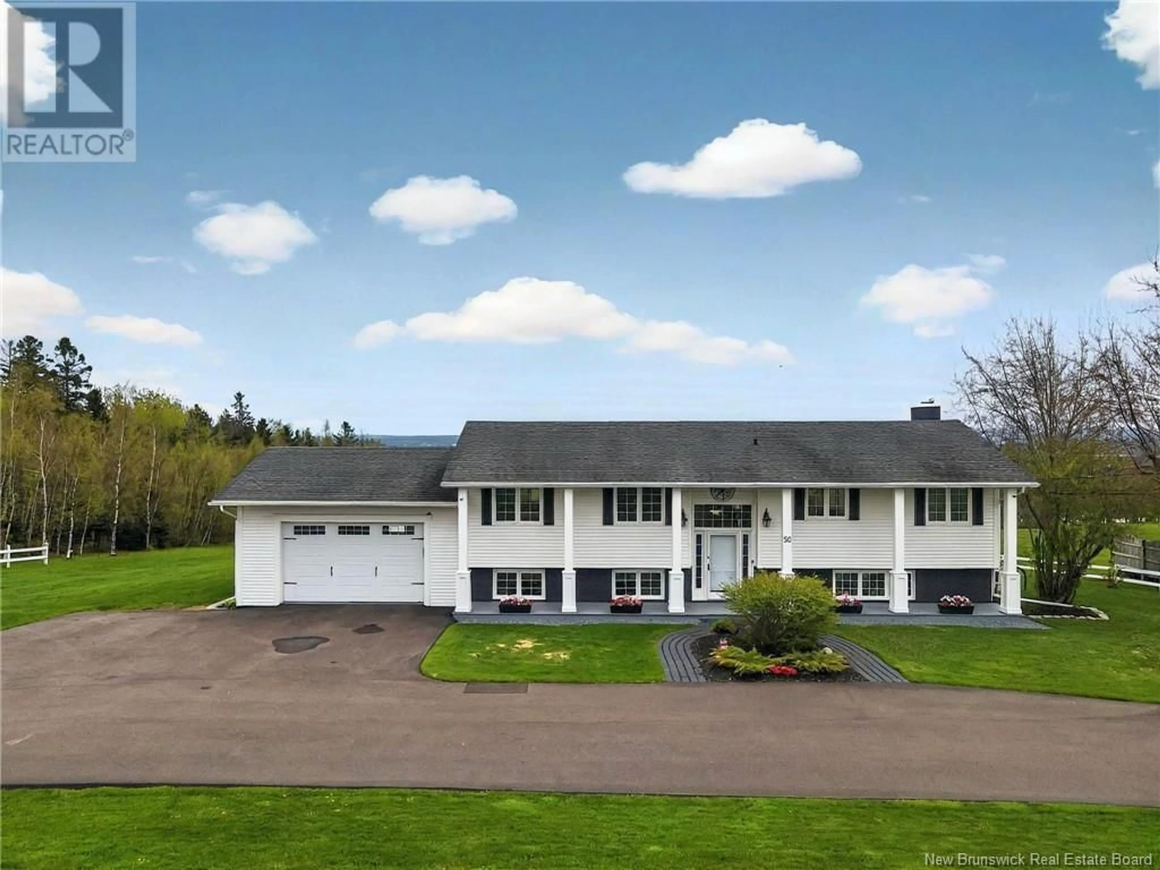 A pic from outside/outdoor area/front of a property/back of a property/a pic from drone, unknown for 50 TIMBERLINE ROAD, Moncton New Brunswick E1G3G8
