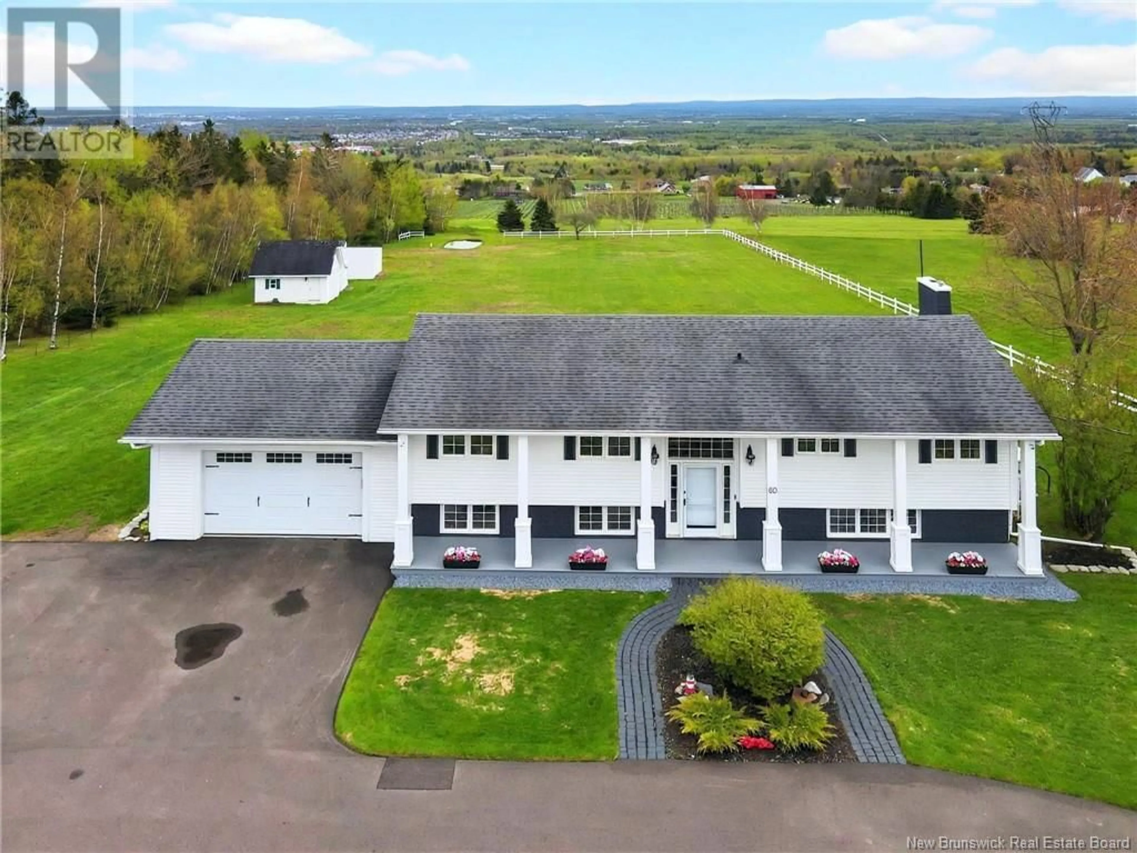 A pic from outside/outdoor area/front of a property/back of a property/a pic from drone, unknown for 50 TIMBERLINE ROAD, Moncton New Brunswick E1G3G8