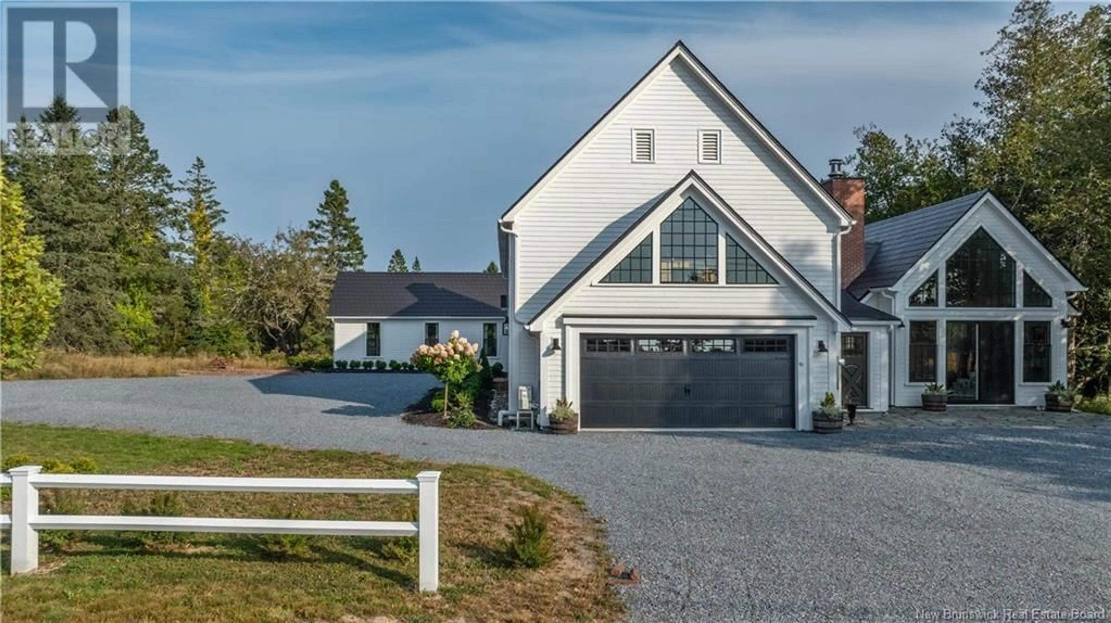 A pic from outside/outdoor area/front of a property/back of a property/a pic from drone, street for 91 CEDAR LANE, Saint Andrews New Brunswick E5B2L4